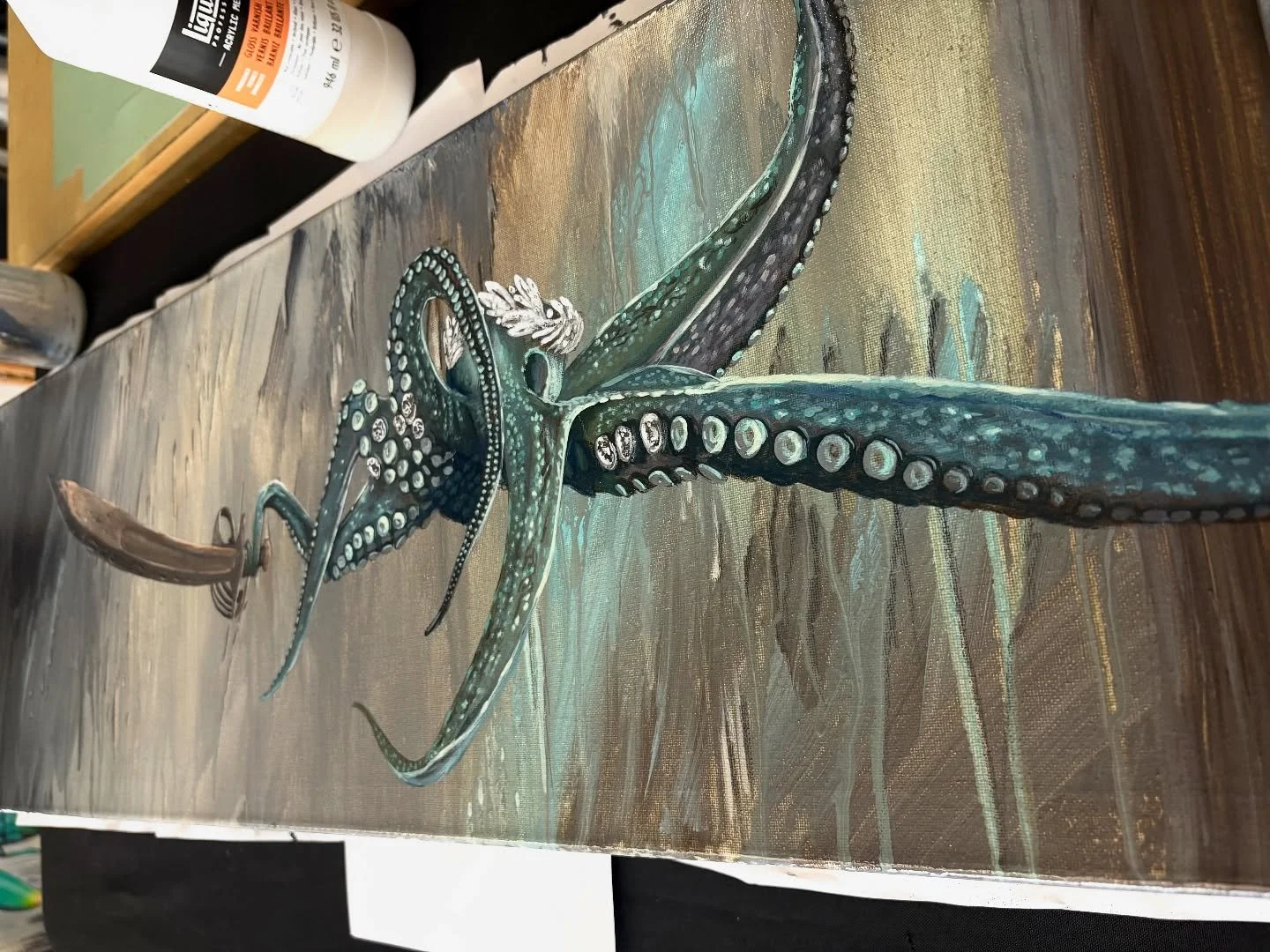 A little varnish goes a long way. 
On Guard, 12x36 acrylic on canvas.