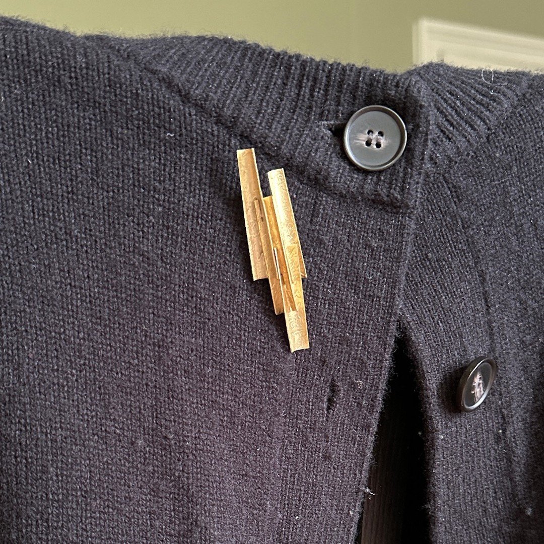 enjoying the sun today, but that means I won't be flashing this little brass brooch on my warm woolly!
