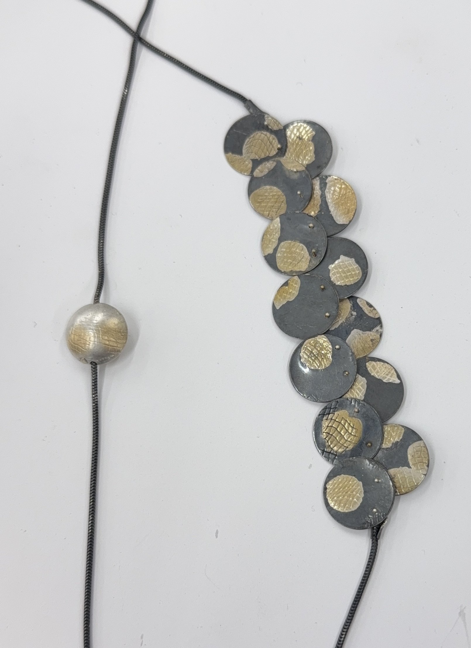 sgavin_4Elephant footprints necklace.jpeg