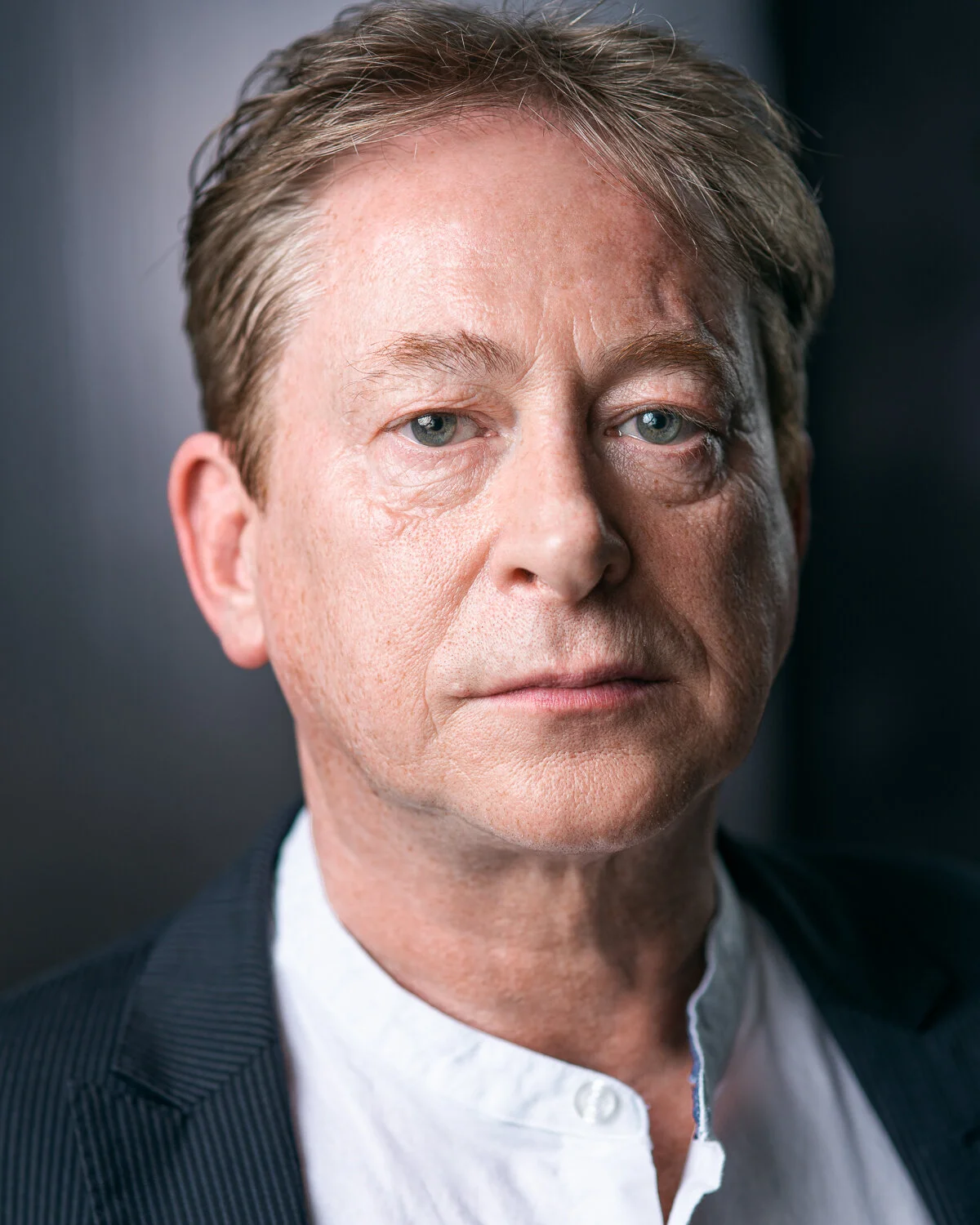 This is a headshot of the actor Alec Westwood