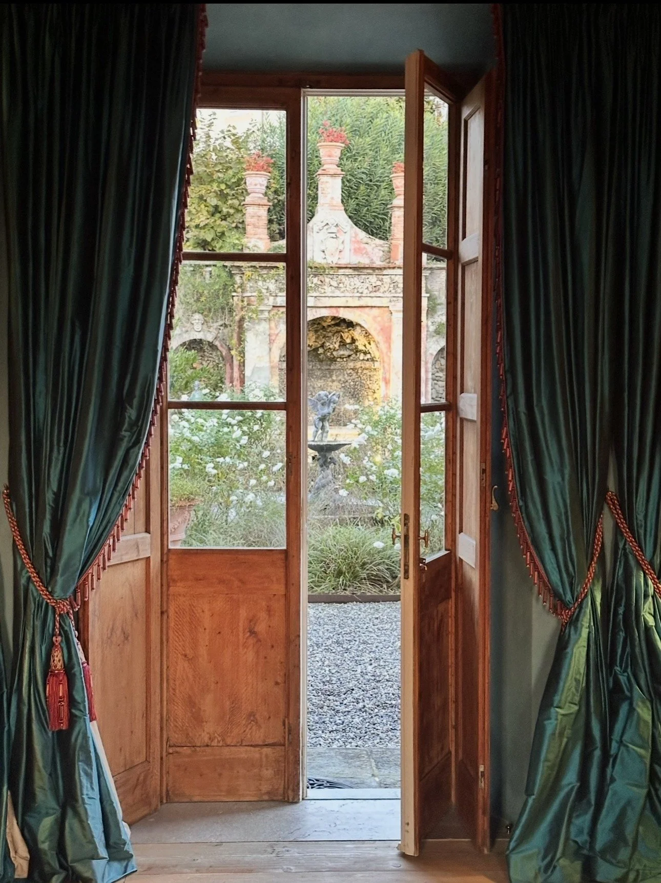 Silk curtains, open doors, Italian light