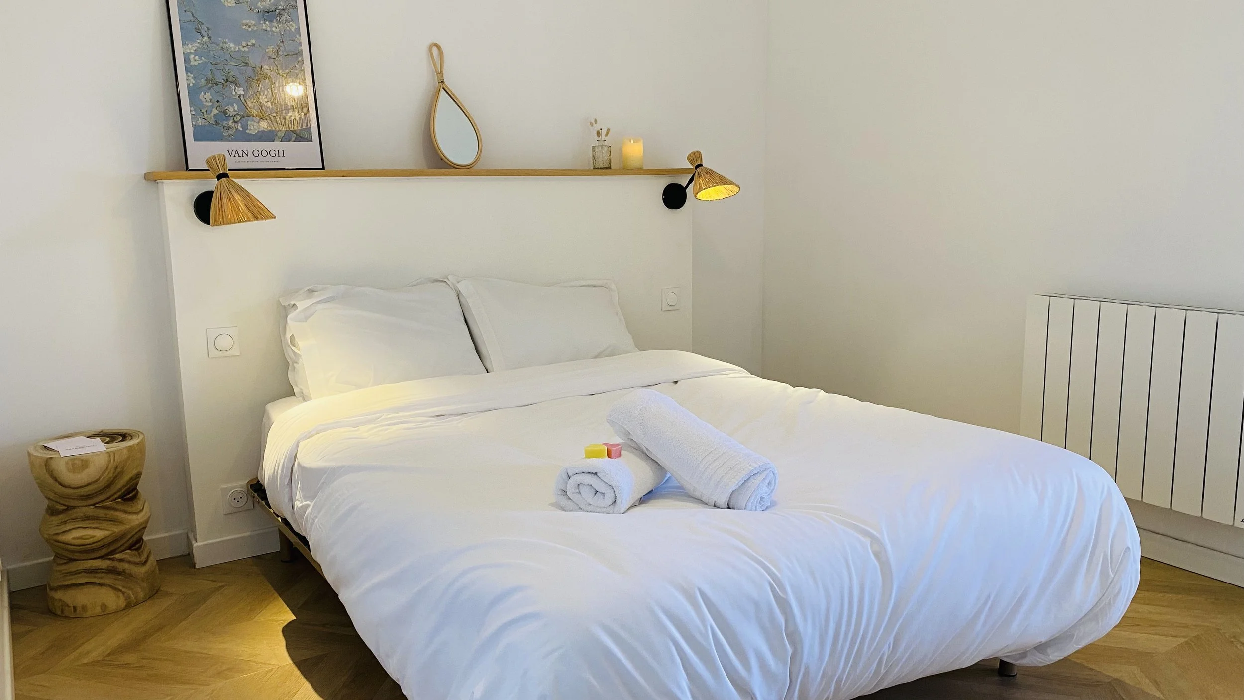 Stylish bedroom with soft lighting and minimalist decor at Villa Magali Arles