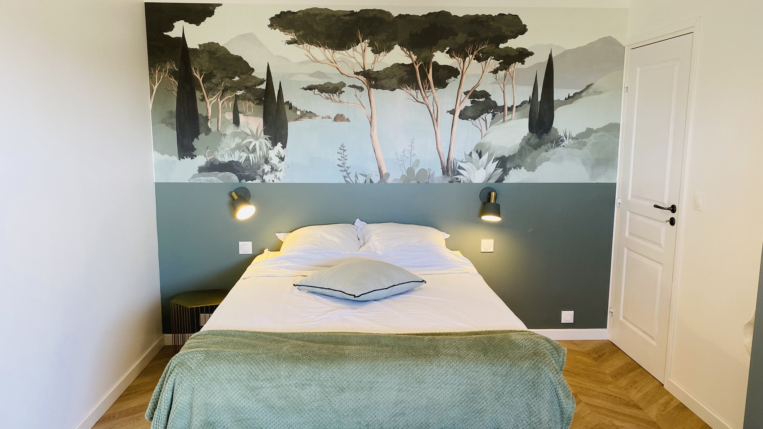 Elegant bedroom with Provence landscape mural at Villa Magali Arles