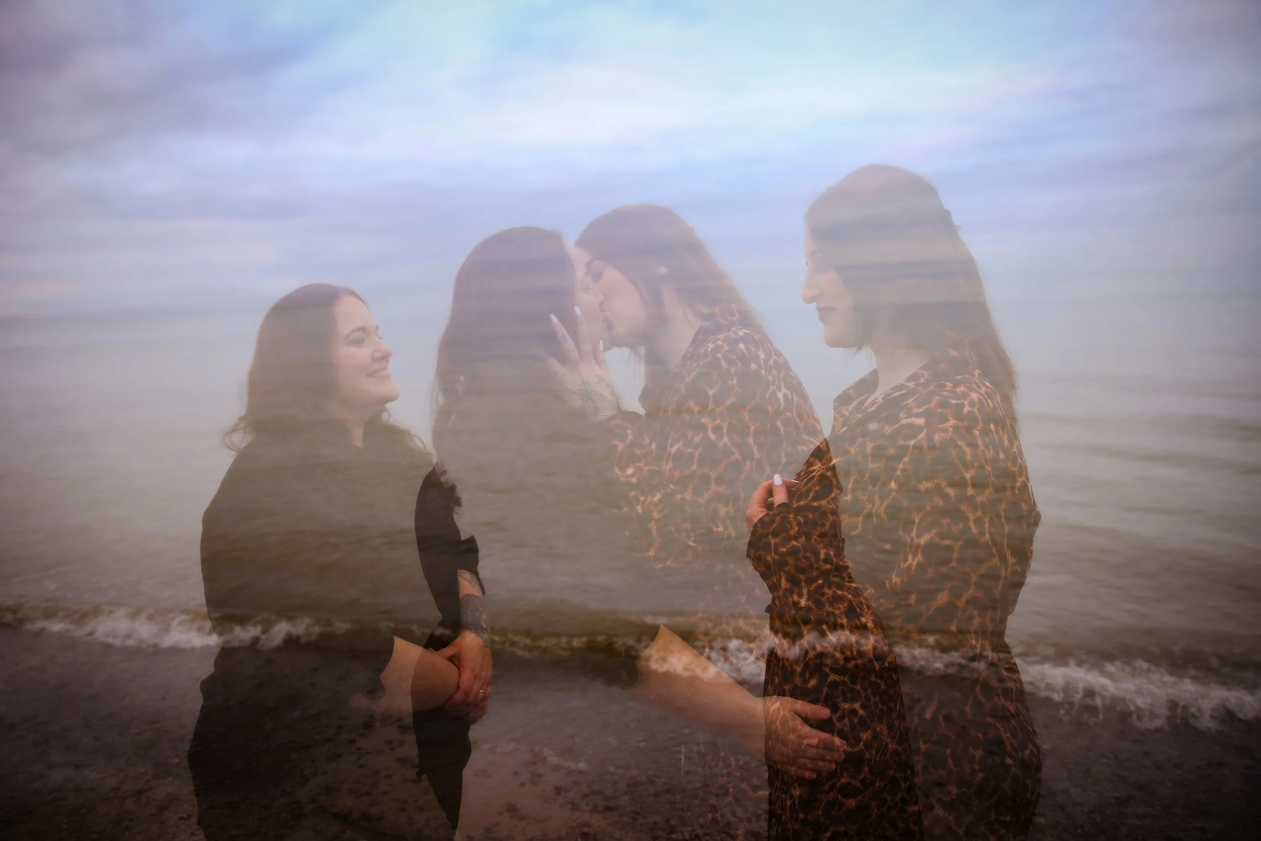 Multiple images of women on a beach, superimposed to show different moments in their interaction: one woman smiling, two women kissing, and two women embracing.