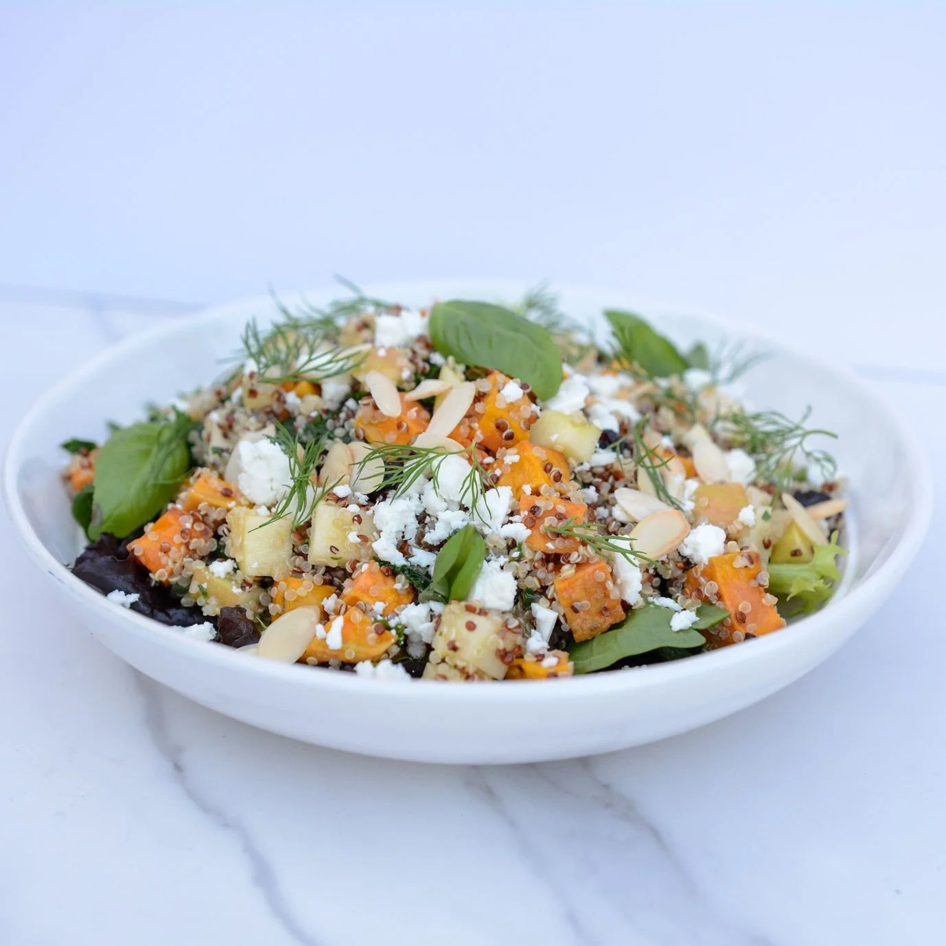 The crisp Autumn air is officially here! 🧡⁠
⁠
Try our Harvest Quinoa salad. This dish is packed with quinoa, apples, squash, almonds &amp; goat cheese. Drizzled with our homemade lemon vinaigrette for an extra pop of flavour!⁠
⁠
Order yours today be