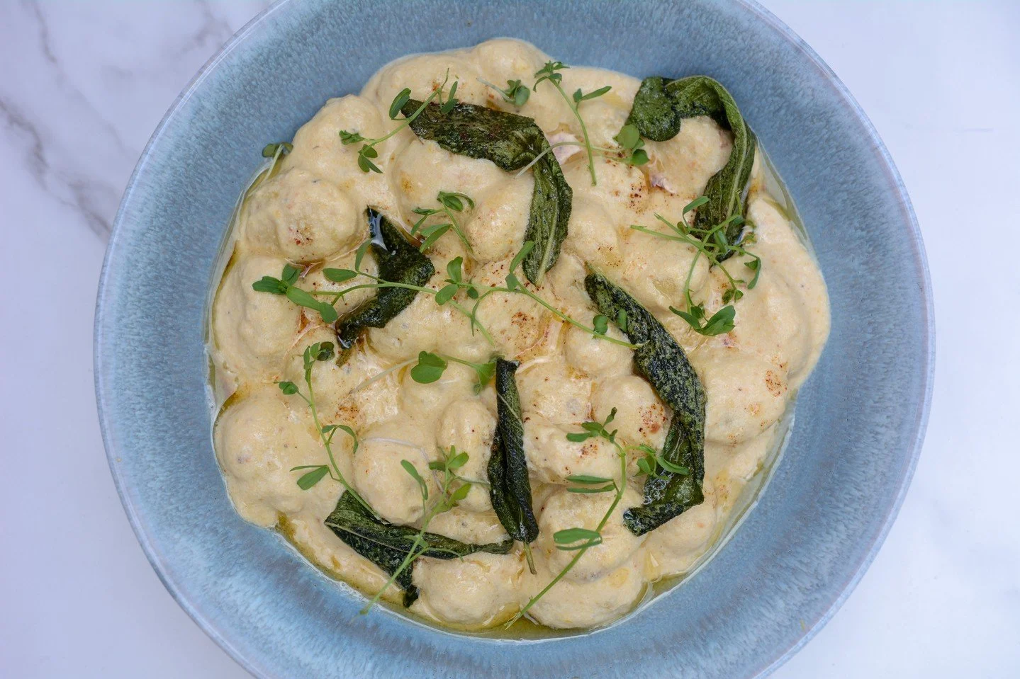 A rich &amp; flavourful dish to keep you warm this weekend. We promise you don't want to miss this feature!⁠
⁠
Ricotta gnocchi with caramelized onion cream sauce, almond crumble &amp; fried sage⁠
⁠
Order yours today by noon for pickup Friday between 