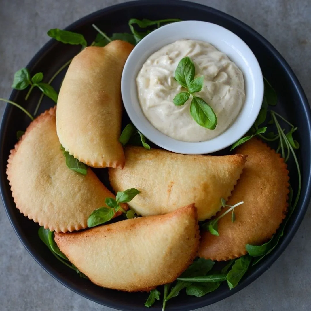 This feature is ready for their close up, swipe right to see! 📸⁠
⁠
Check out our delicious cheesy panzerotti. These little pockets are filled with pepperoni, tomato sauce &amp; mozzarella cheese. Just one bite &amp; you'll be hooked!⁠
⁠
Order yours 