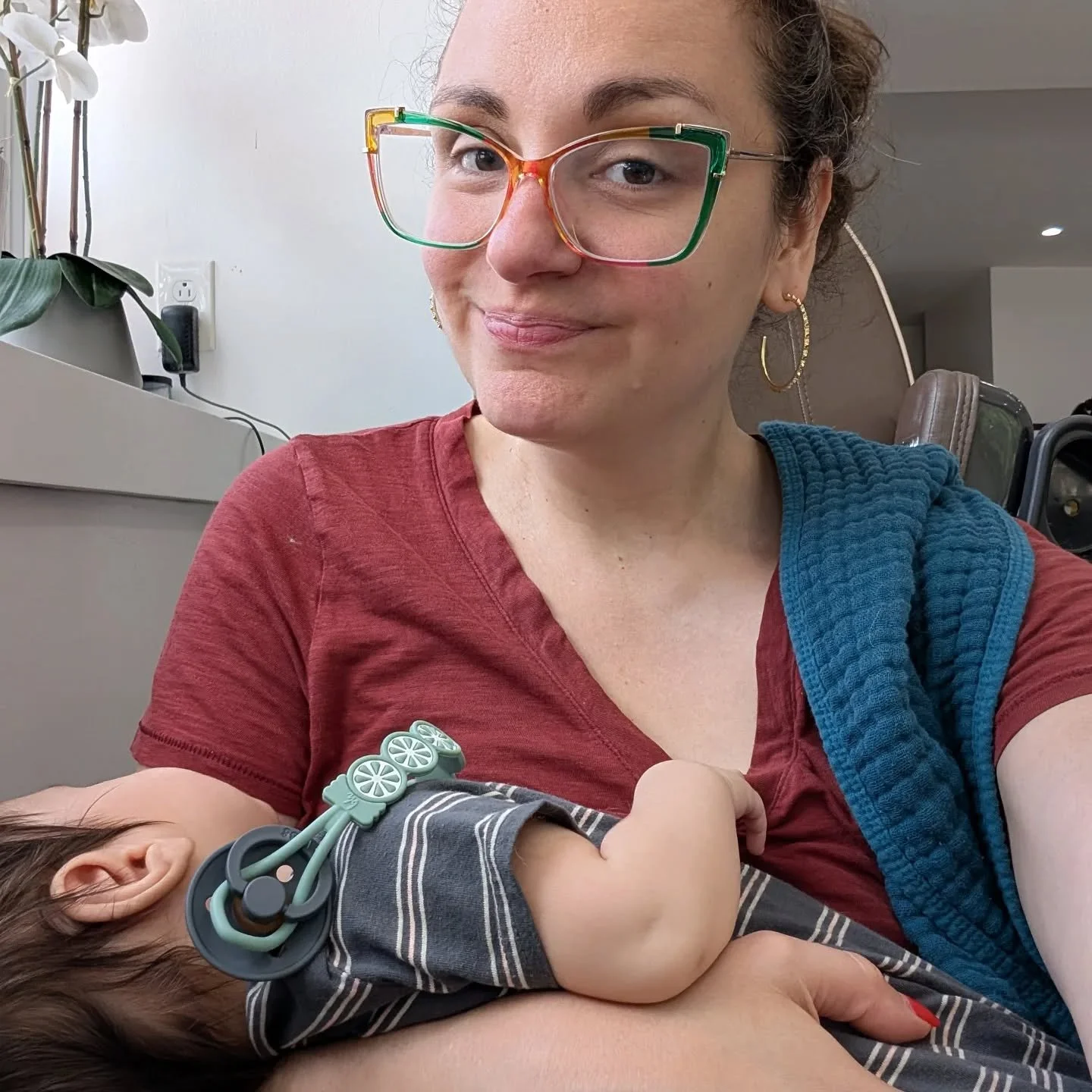 Walked the two blocks down the street holding Elliot to the nail salon. Just held him in the pedicure chair the whole time while he first looked around and then slept. Thanks for making things easy, kid.