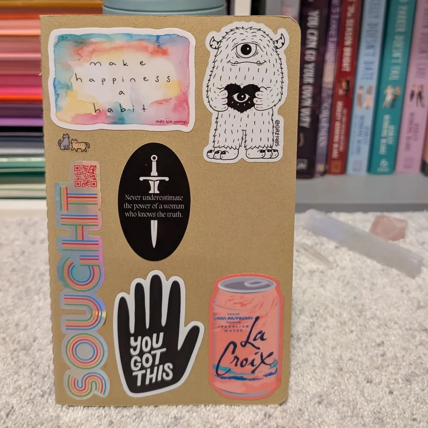 I never know what to do with cool stickers, but this morning I continued to decorate my tarot notebook. Honestly, I love this combination of cool shit my friends made and cool swag/merch.