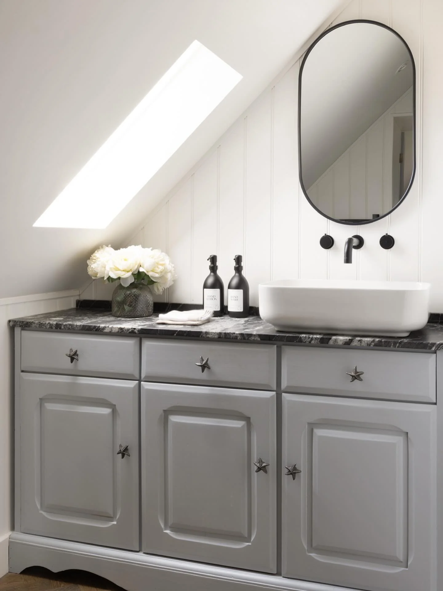 Blue with Starfish was the brief. Tick, and tick! 

Swipe to see this loft bathroom before - literally nothing there! More wasted space in a floorplan that is now hugely improved. Previously guests had to go downstairs for a shower or a midnight tink