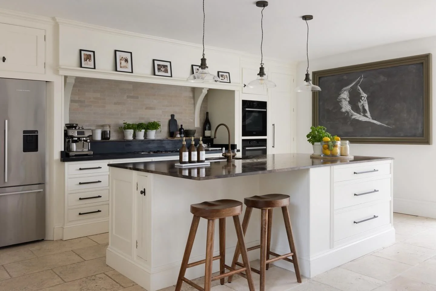 It was a major undertaking to repurpose this kitchen, but it was sooooo worth it. All the right cupboards, now all in the right places.

Swipe to see the Before : The most terrible and just plain bizarre layout. 

Shere Madness is a boutique interior
