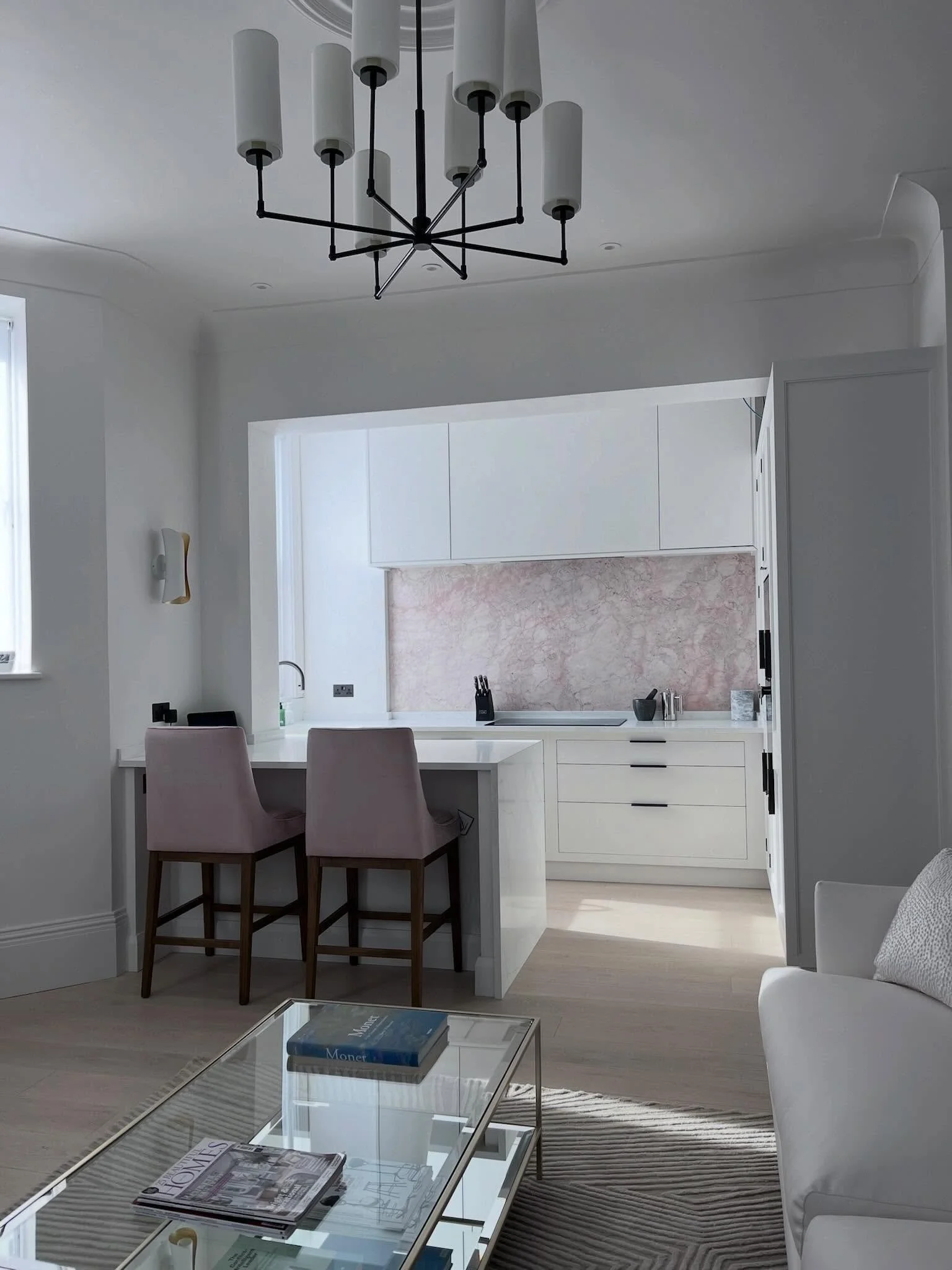 Can you see a running theme here? More pink in the form of this stunning marble splashback. 

This apartment is in a mansion block with an ancient communal heating system which only allowed for three radiators throughout the entire three bedroom apar