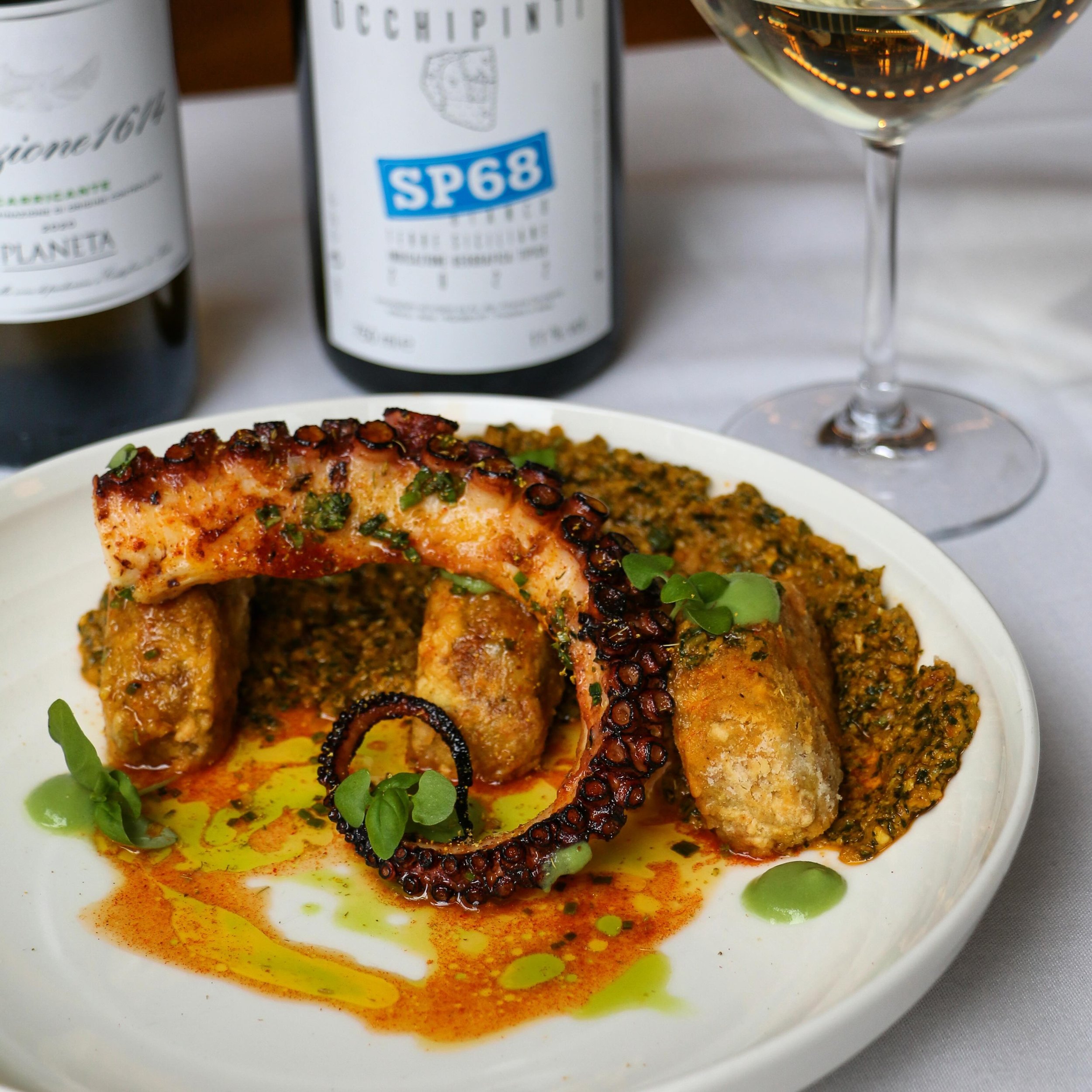 STARTING TONIGHT (through 4/17) 🍷🍋 Join us to celebrate the best female winemakers of Sicily with a limited-run tasting menu 🍋🍷

[First Course] Spicy Grilled Octopus: pesto alla trapanese, almonds, chickpea fritters, castelvetrano olives, basil

