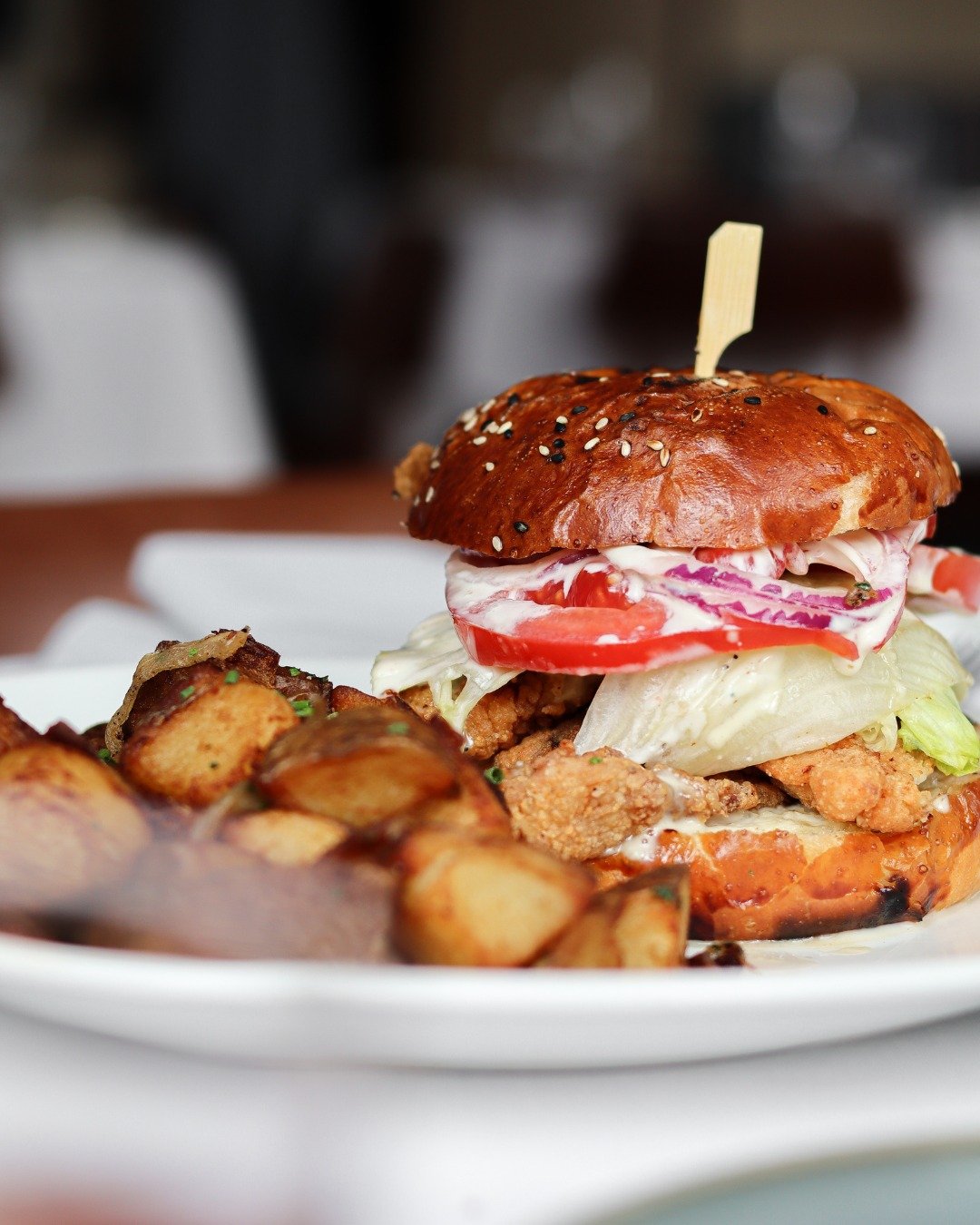 On menu for brunch this weekend: our Fried Chicken Sandwich with hot honey, bleu cheese dressing, lettuce, tomato, and a sesame bun. Stop by Saturday, or join us Sunday for live jazz.