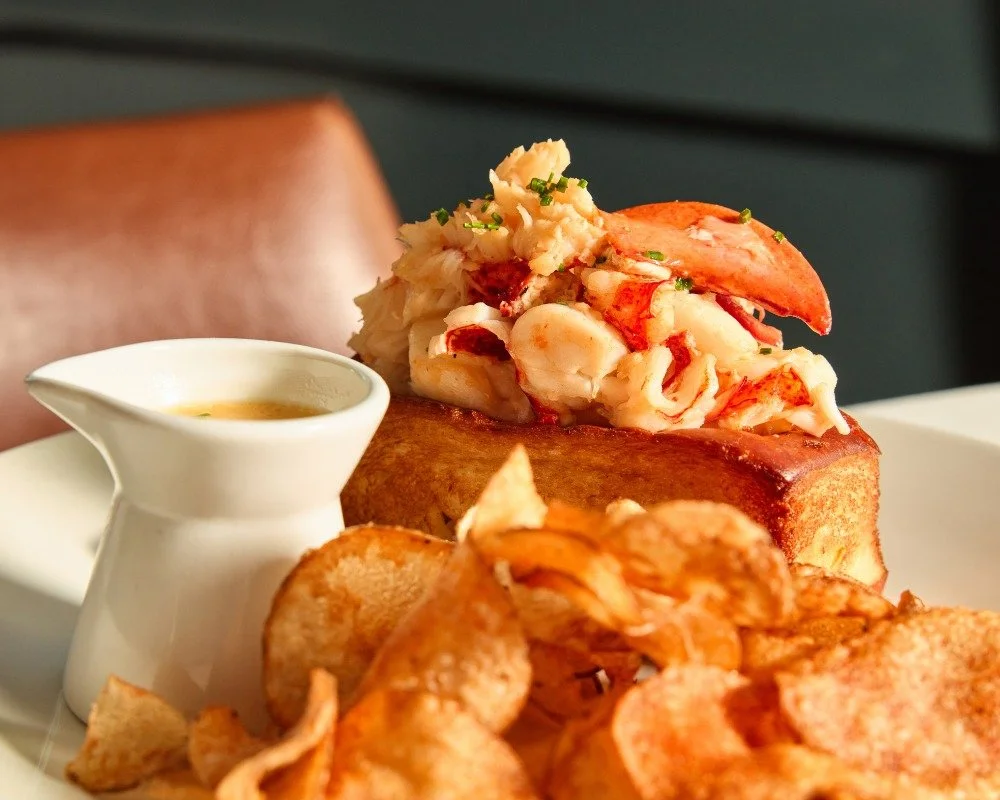 The Banks's Lobster Roll: juicy lobster, buttery brioche, and Old Bay potato chips. Your plate is waiting...

📸 @briansamuelsphotography