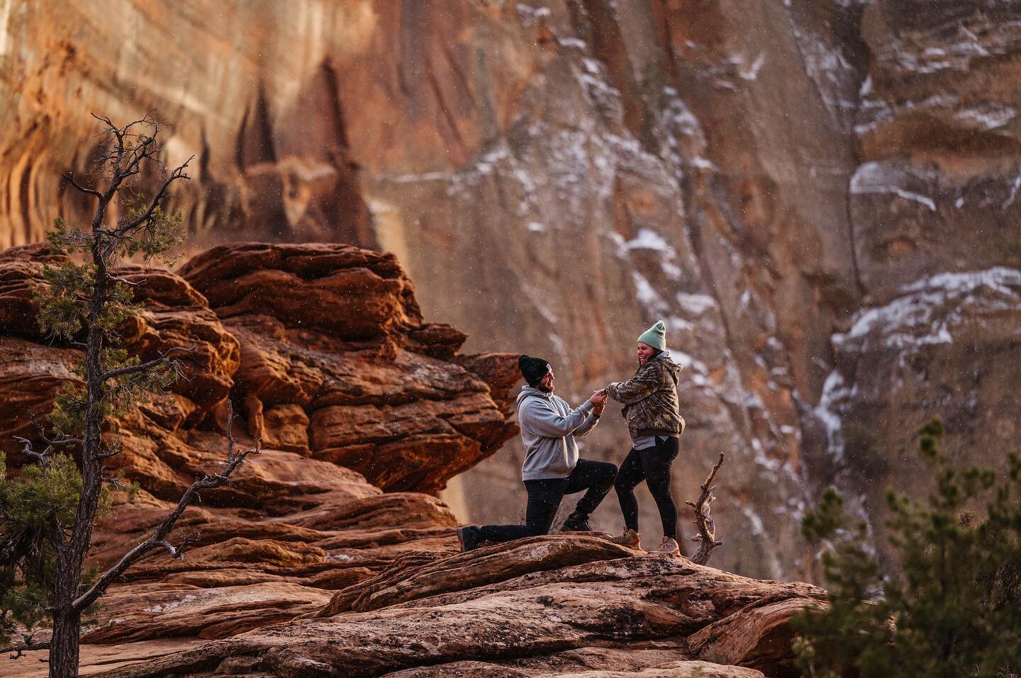 Proposal at the top of Zion‽ Yes Please! When Chris called me a couple weeks ago to see if I&rsquo;d be up for photographing him proposing to Gabby at the edge of the Zion Overlook, I jumped at the chance! They flew from Florida and brought the hint 