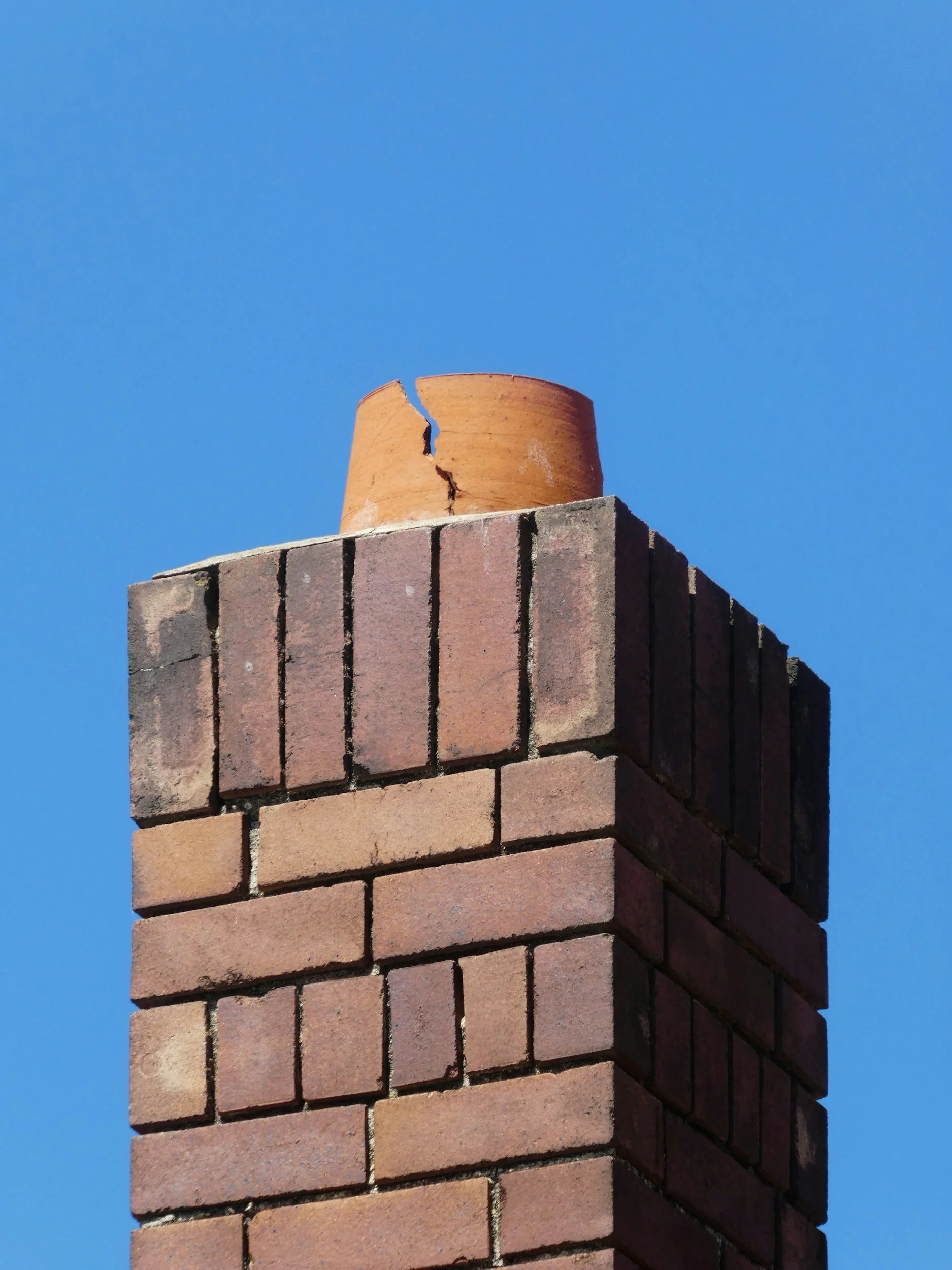 Winter Protection: Why Michigan Homes Need Chimney Caps