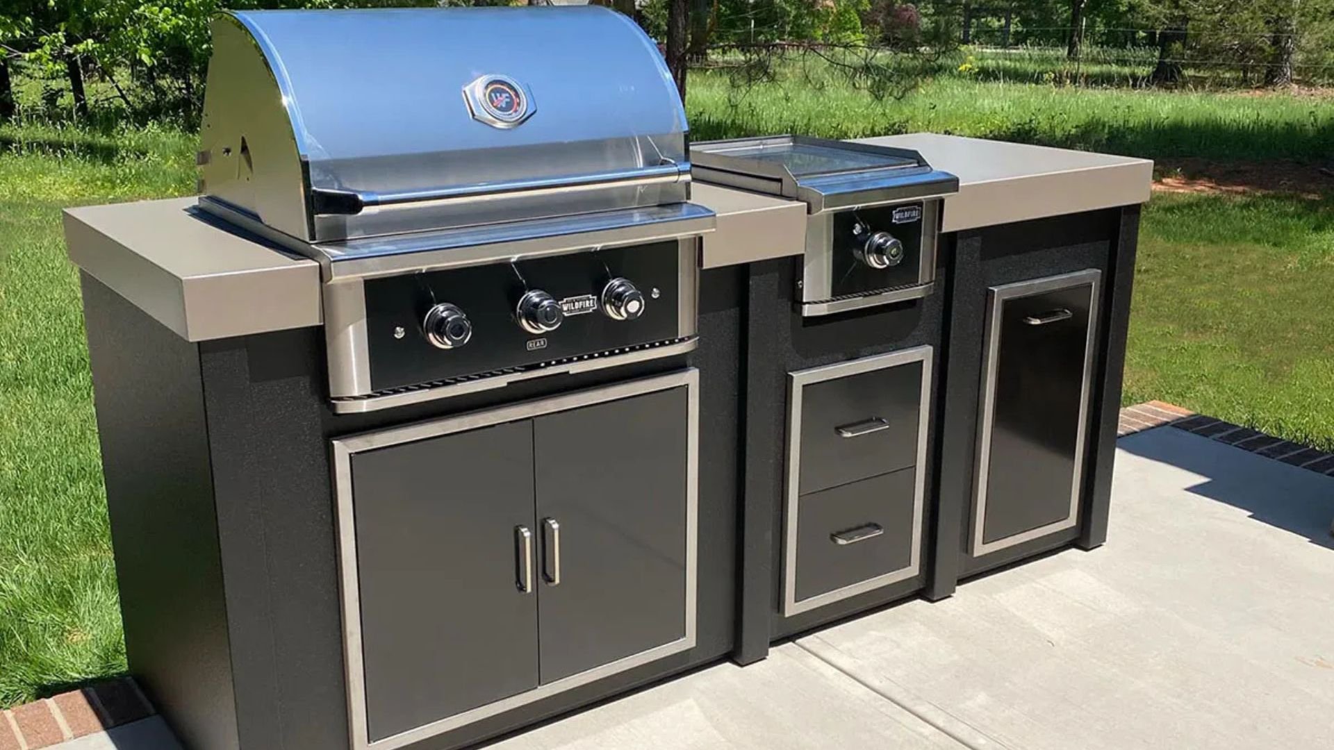 black stainless steel outdoor grill with island