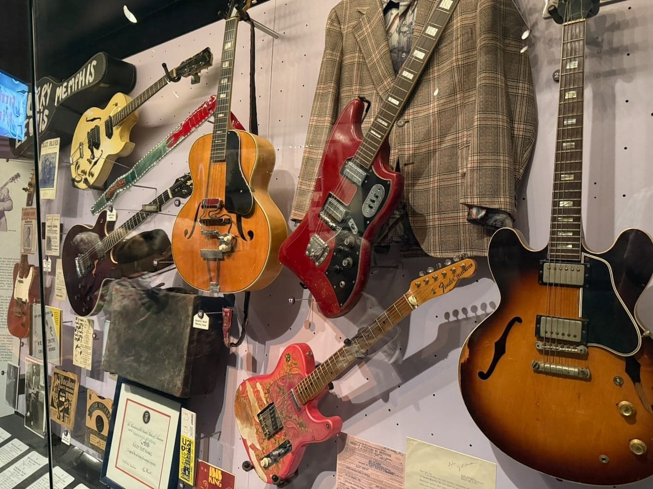 An exhibit in the "Roots of Rock" section of the Rock & Roll Hall of Fame showing historical items from B.B. King, Howlin' Wolf, and other great blues artists that influenced rock & roll.