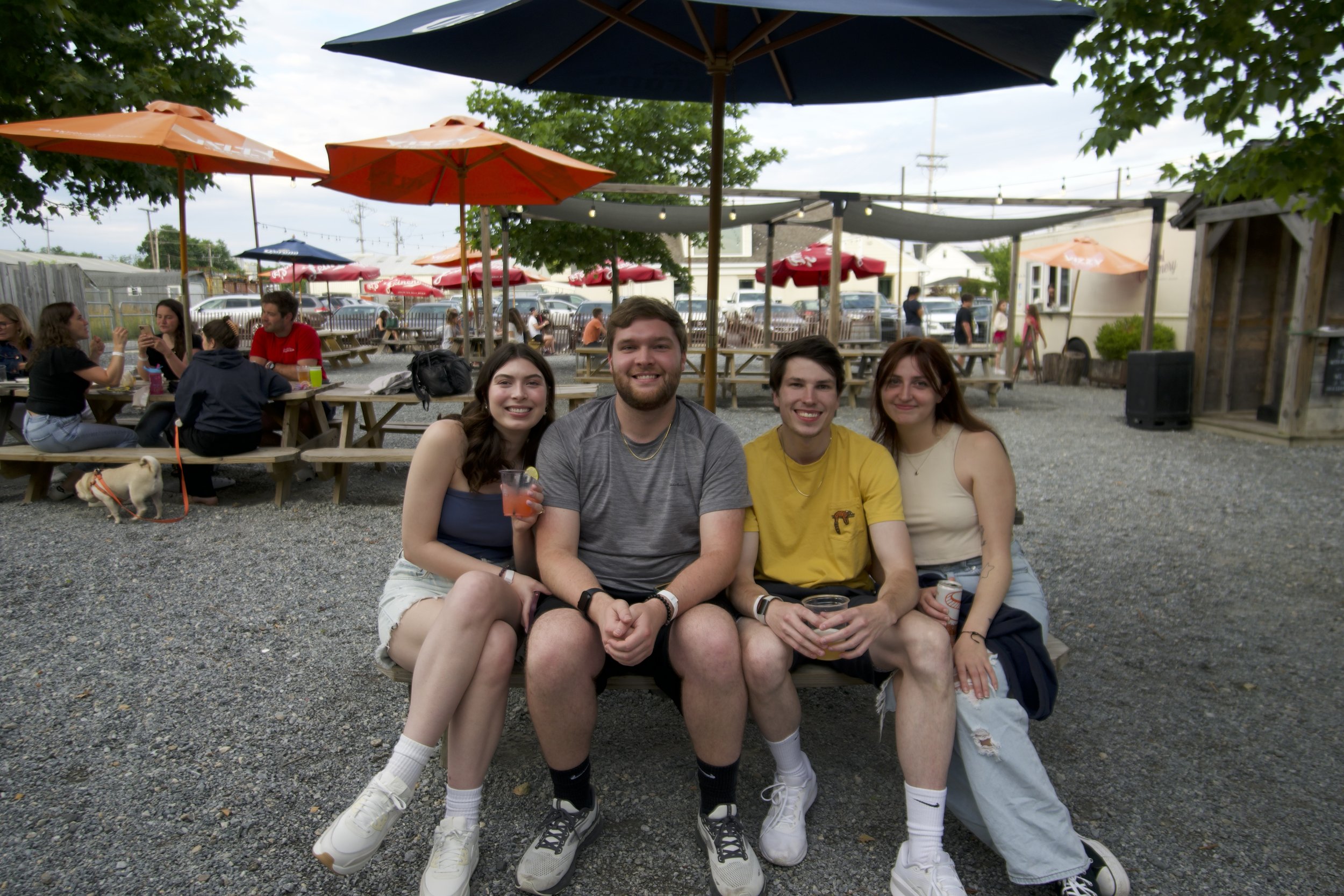 Group of friends at The Kennett Creamery on a bright day.
