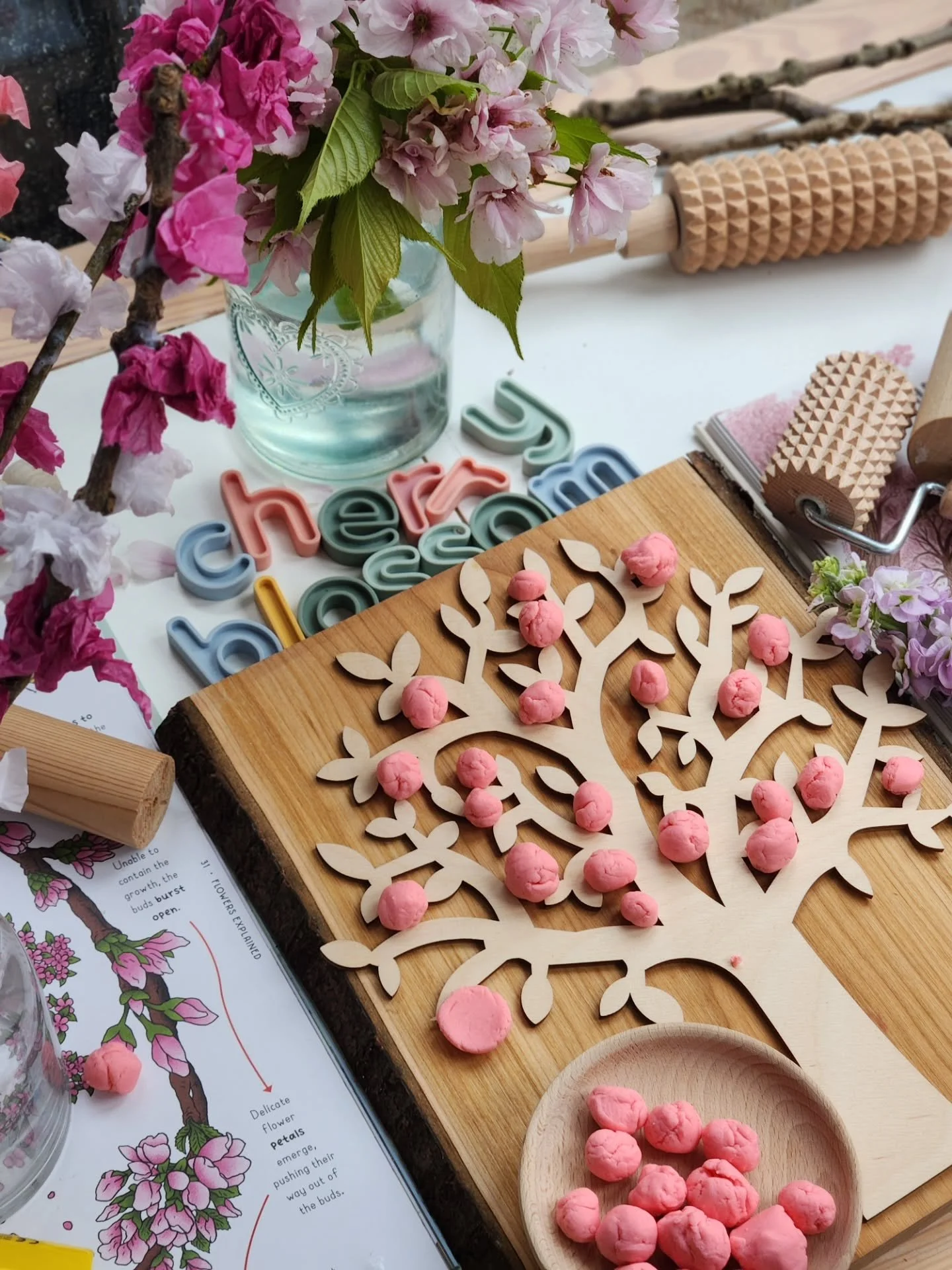 Cherry blossom season 🌸

A beautiful little playdough setup for rolling, pushing, squeezing and squashing (or should we say smooshing!) those tiny blossom flowers 🌸✨

Using the wooden hammer makes it even more fun for little hands while building fi