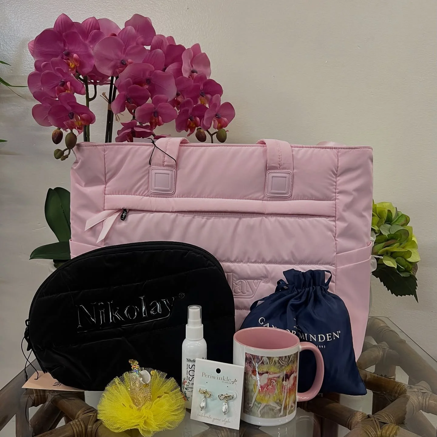 Ballerinas, this bundle is a dream! 💕 We&rsquo;ve teamed up with @childrens_ballet_of_sa for their Silent Auction, and our Tutus &amp; Ribbons Pamper Me Bag Bundle is up for grabs!

💄 Nikolay tote &amp; makeup bag ✨ Nikolay SOS spray 💖 Pearl earri
