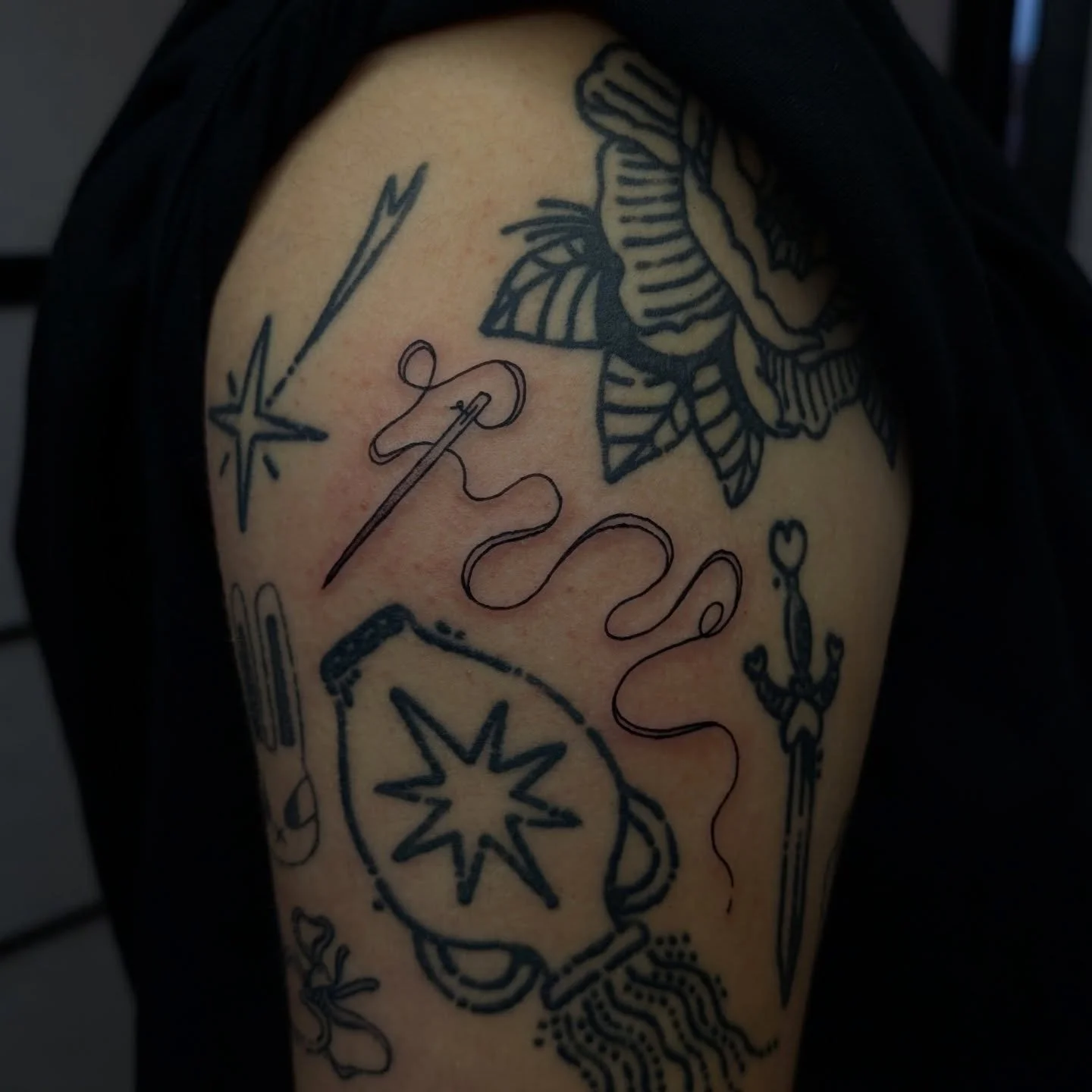 A little sewing needle and thread gap filler for my Holly | booking now for January 

Everything else here apart from the bunny is all healed work by me 🙂&zwj;↕️
.
Done at @niramittattoostudio 
.
#tattooideas #ink #inked #blackwork #illustration #li