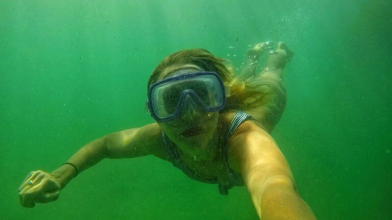 I am so cold in this picture, but also committed to swimming in this beautiful water!