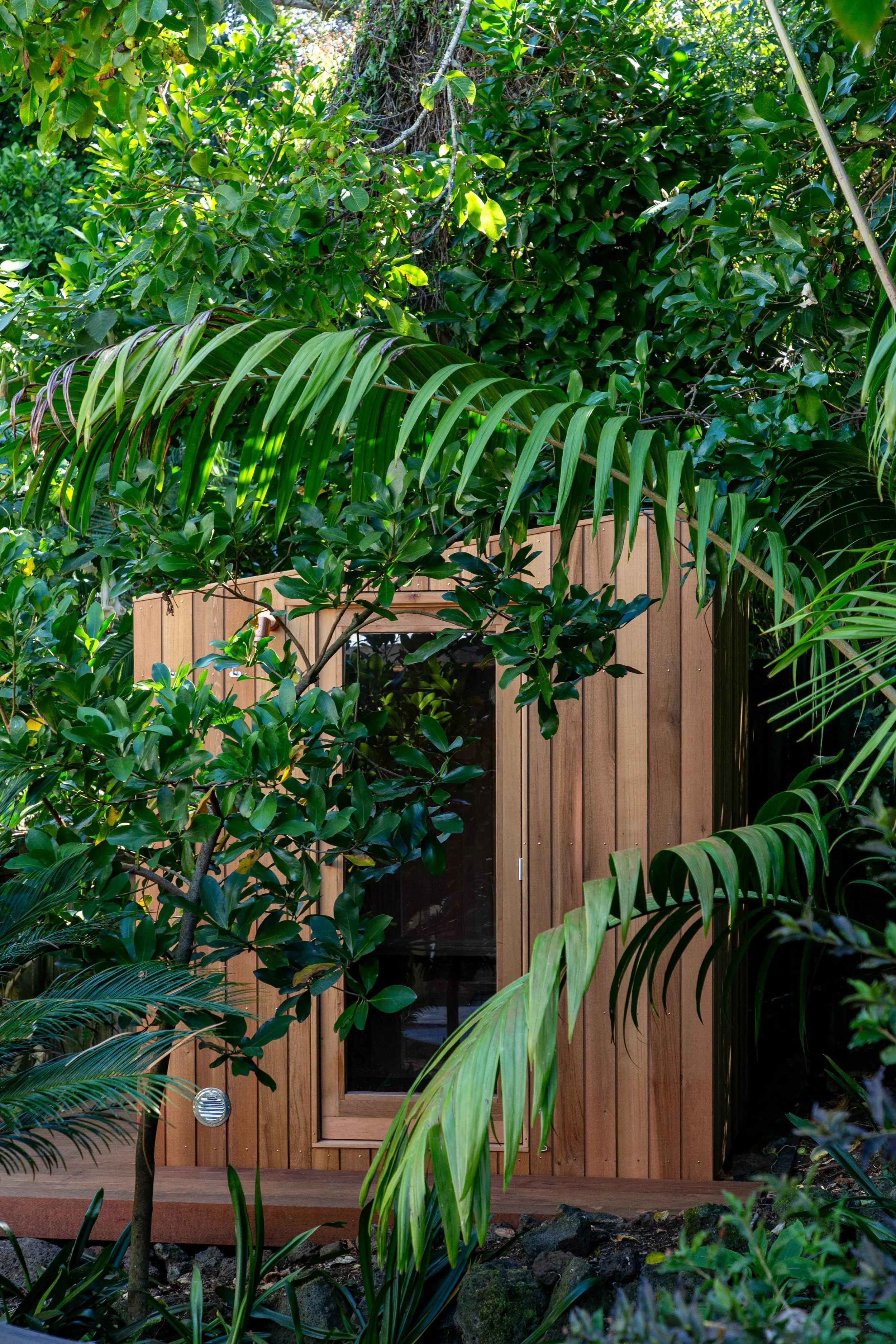 Outdoor Sauna blending perfectly into the established Mount Eden garden, designed and built by Hideway.