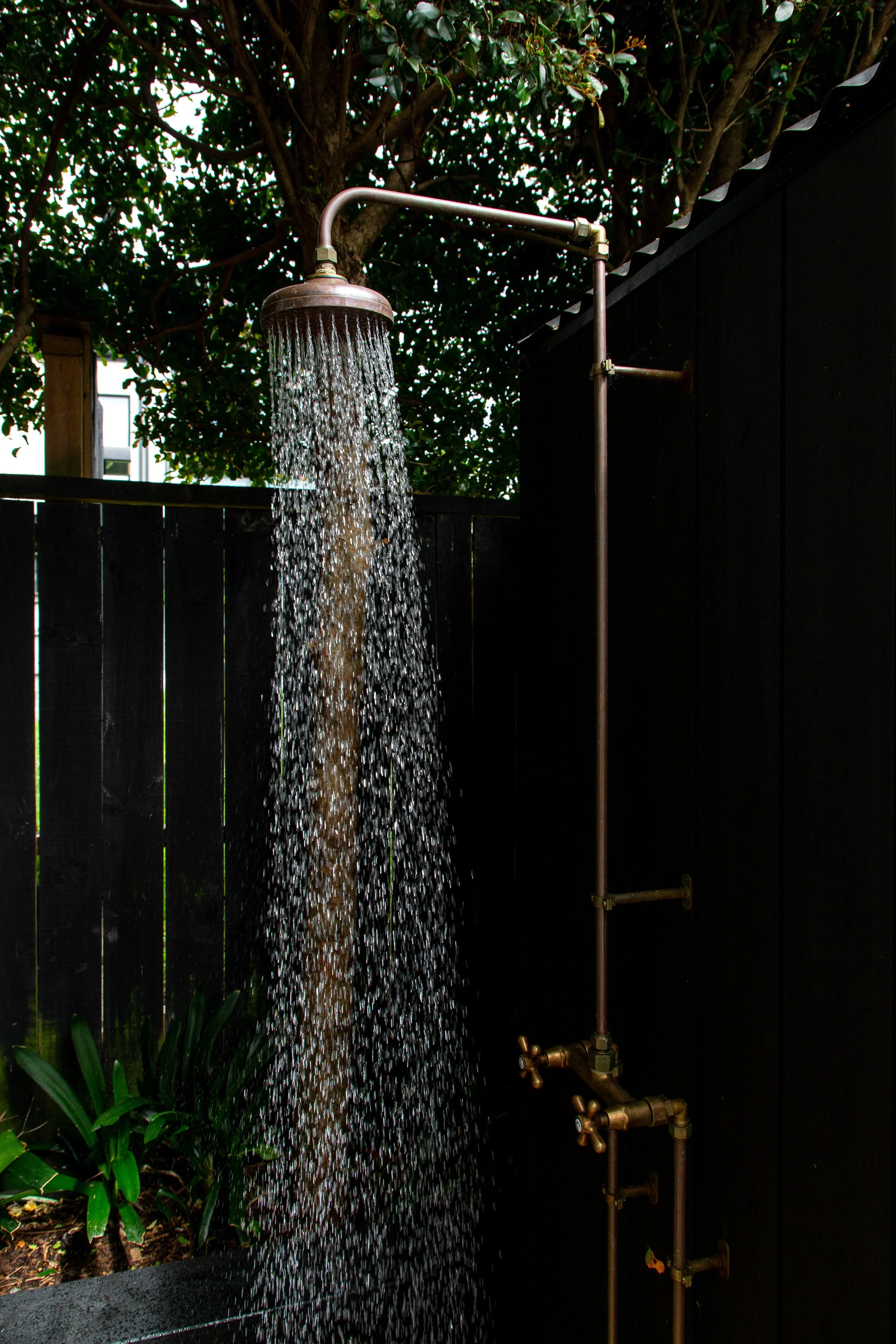 Cold Copper Shower installed to side of the Garden Sauna elevating the space and the sauna experience
