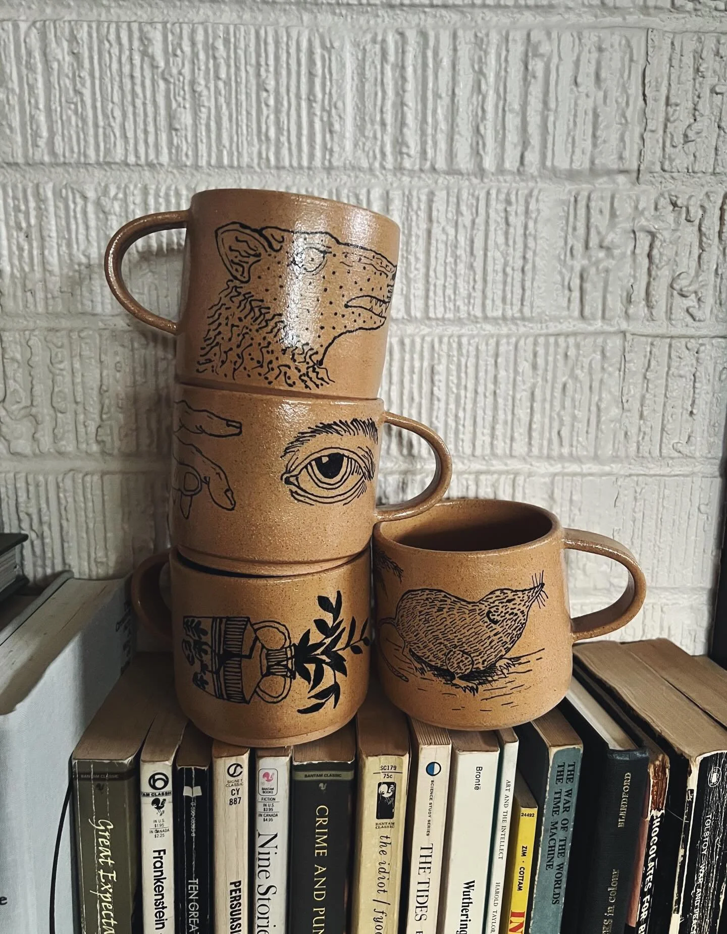 In the shop now! Hand painted mugs 👁️