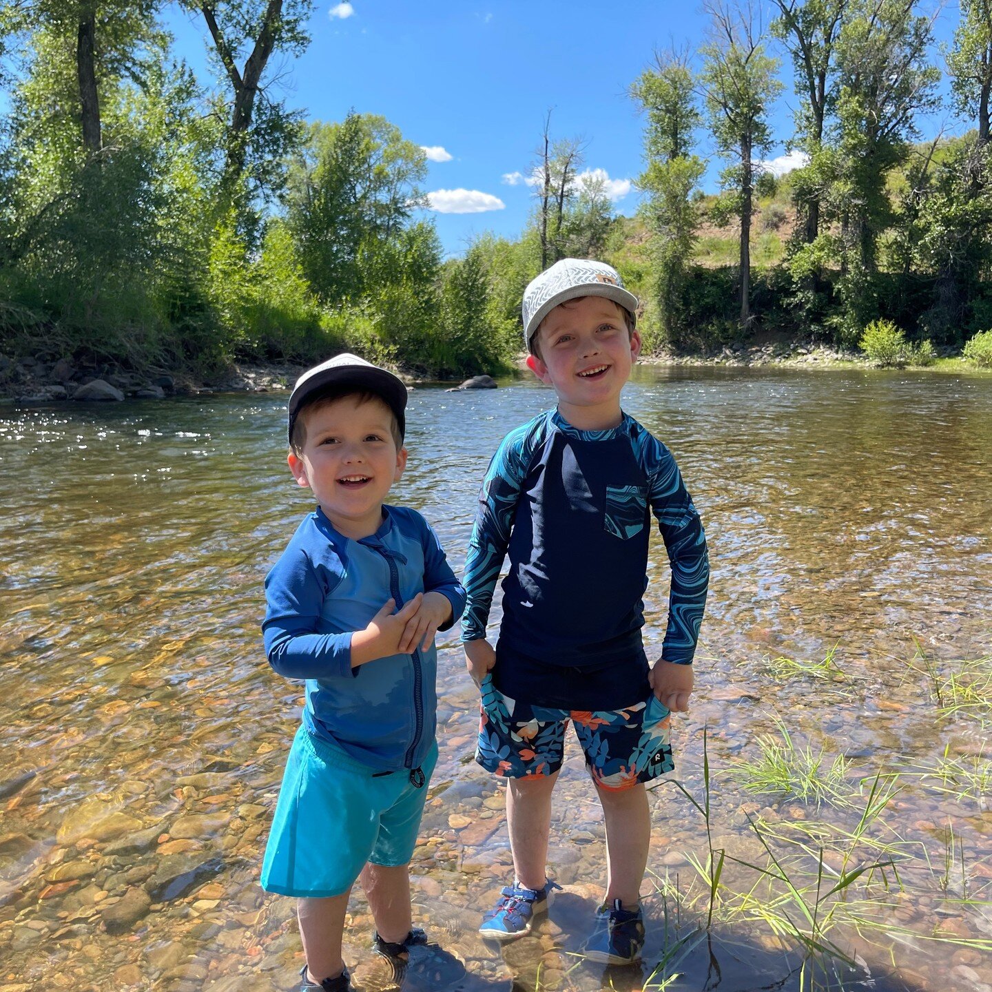 Brady and Bennett rocking #Reima while enjoying the river! Playing it safe with 50+ UV protection. Stay cool B &amp; B!