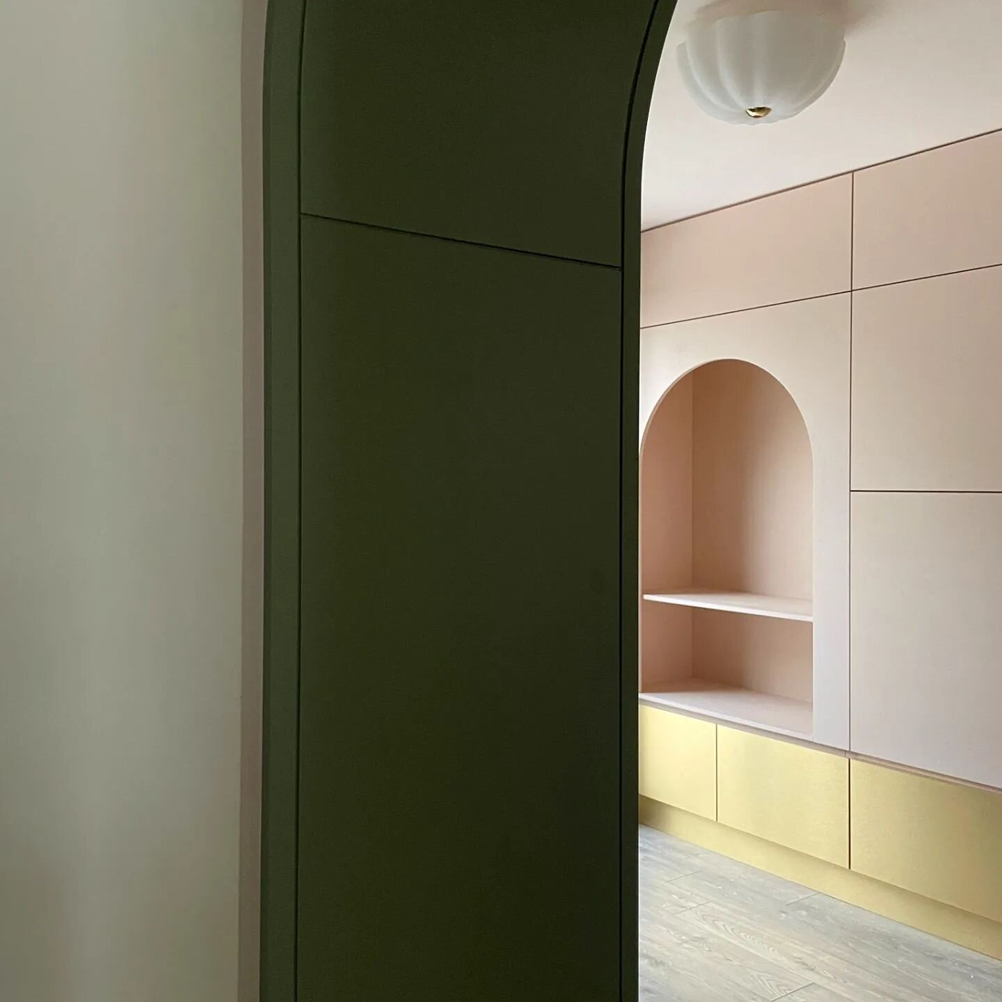 A little peek through the arch from the hallway of this pretty playroom. A dream project. 🌸🥦💛 Thanks to the beautiful client @lisamariedunne for sending me this photo #joinery  #bespokedesign #homereno #interiordesignservice #greenpinkgold #arch #