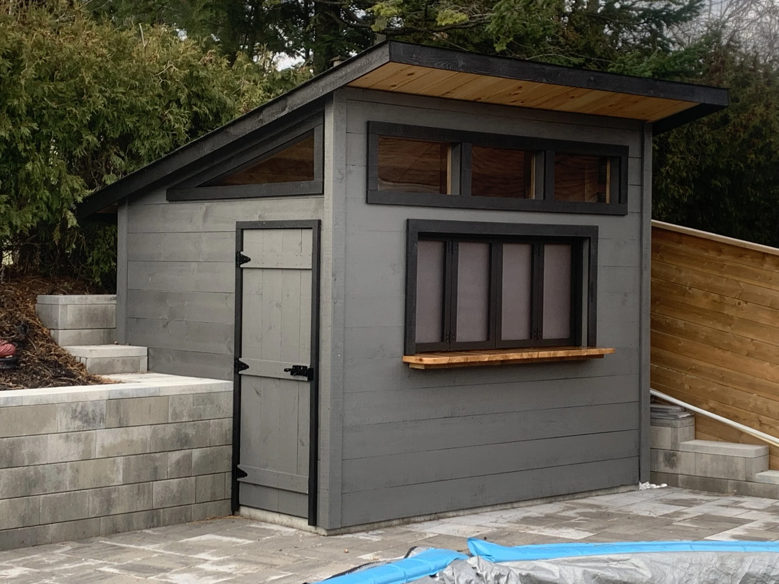 Shed:   
8x10 Lean-To (82" Eave) $5026  
 Options:   
2'x10' Overhang $616  
6' Cedar Bar & Windows $ 1260 
Custom Stain $195 
4 x Windows $600 
Modern Siding: $576 
 Total: $8273