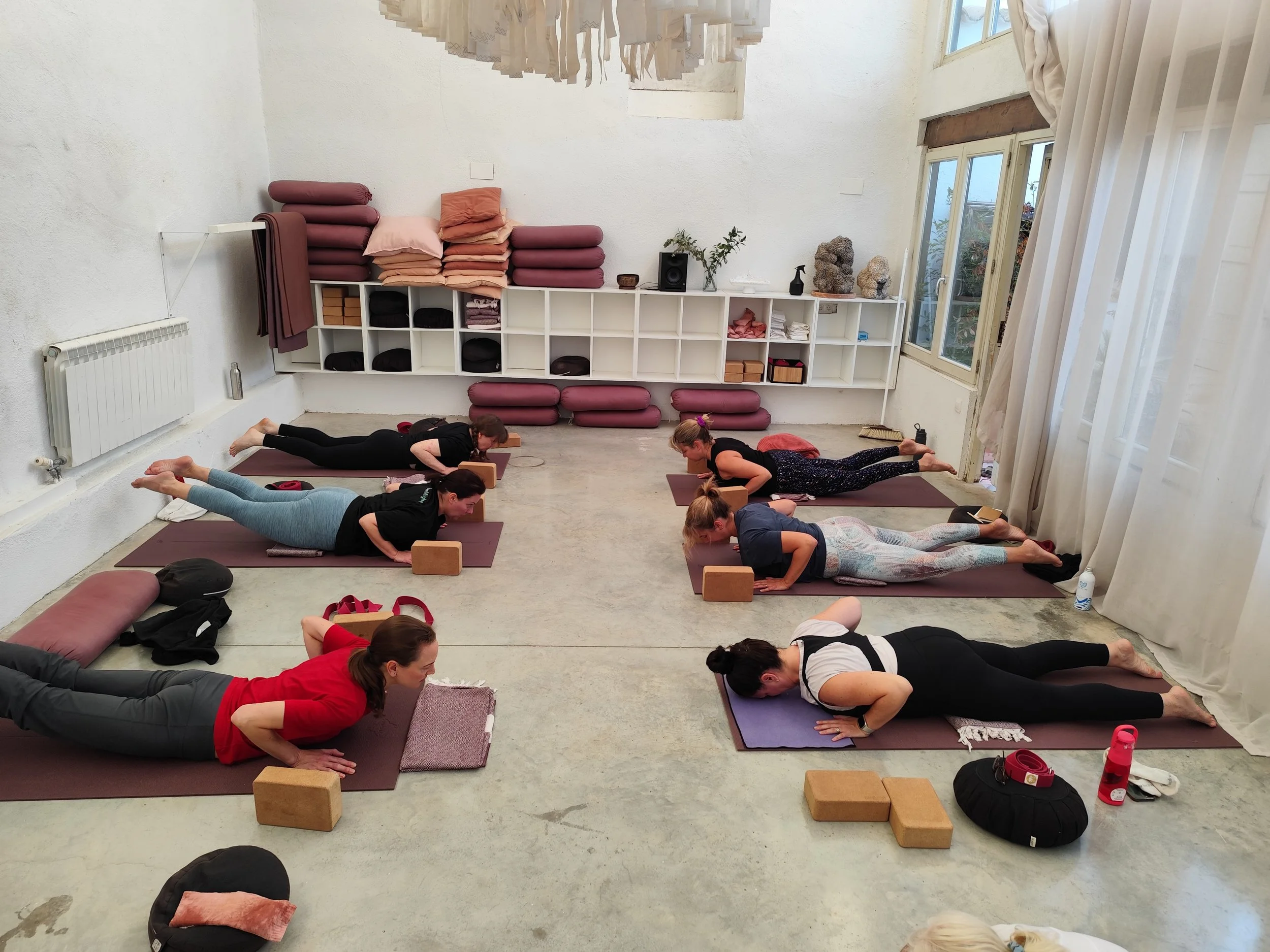 Yoga class outdoors at GetCalmer women's wellness retreat