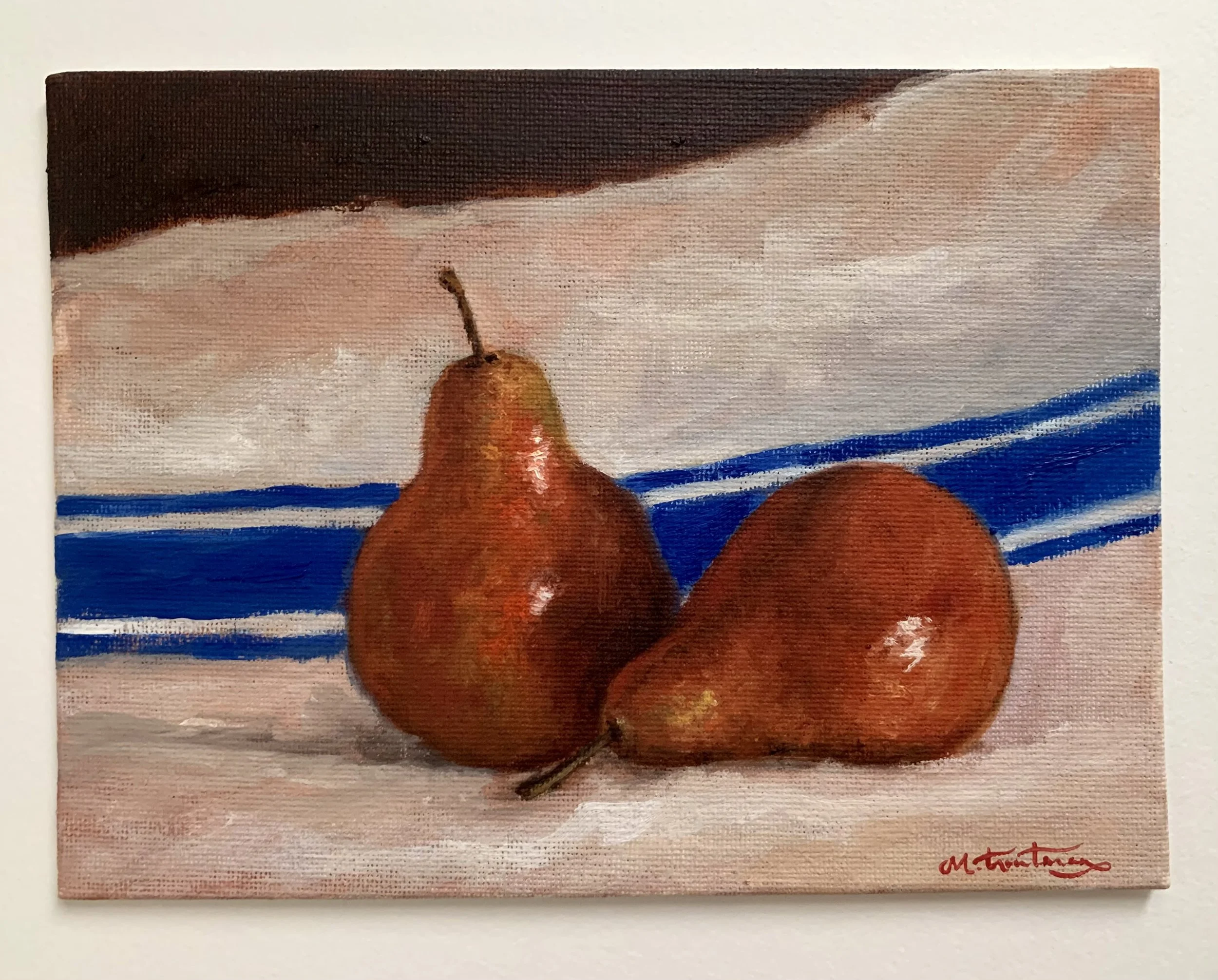 red pears on kitchen linen