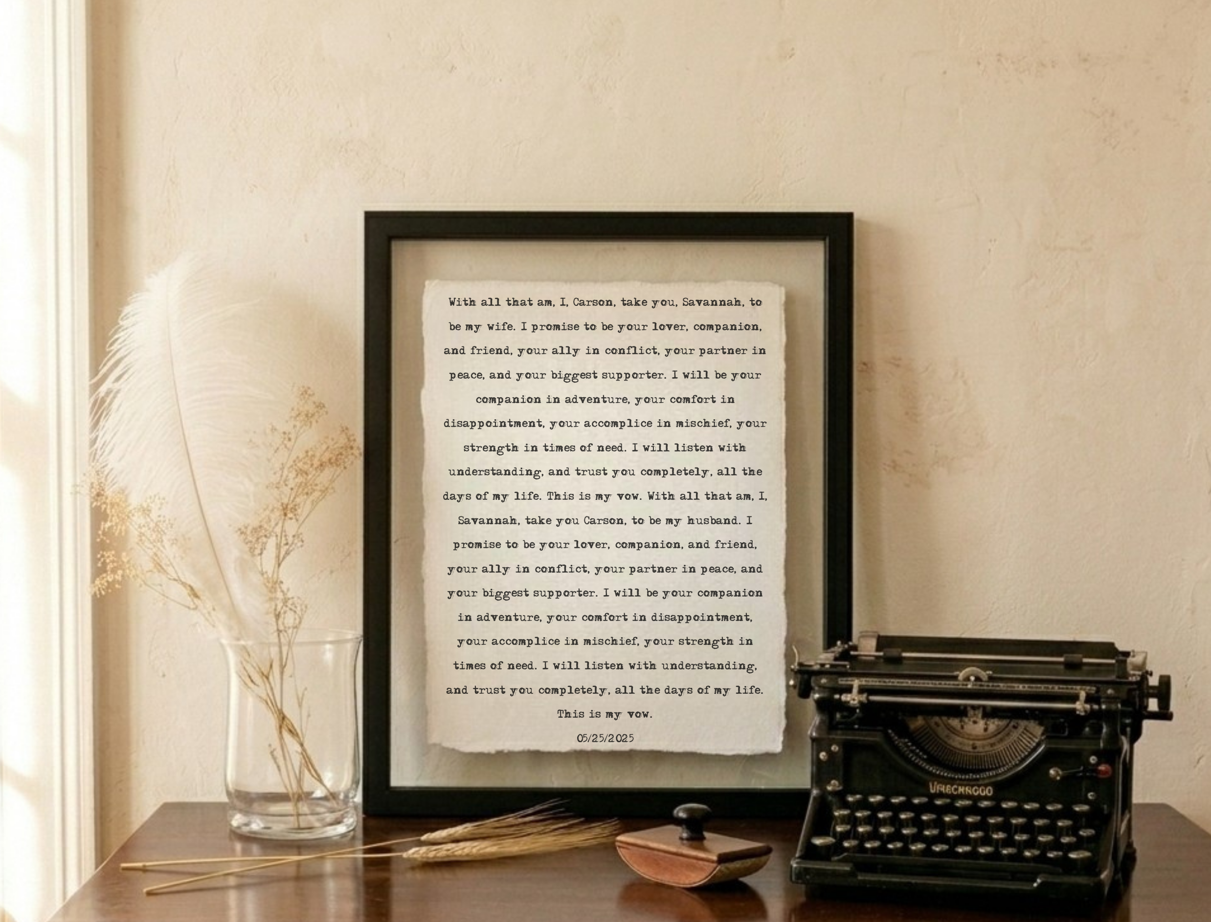 Black framed wedding vow print beside vintage Underwood typewriter - hand typed on handmade cotton paper for 2nd anniversary gift