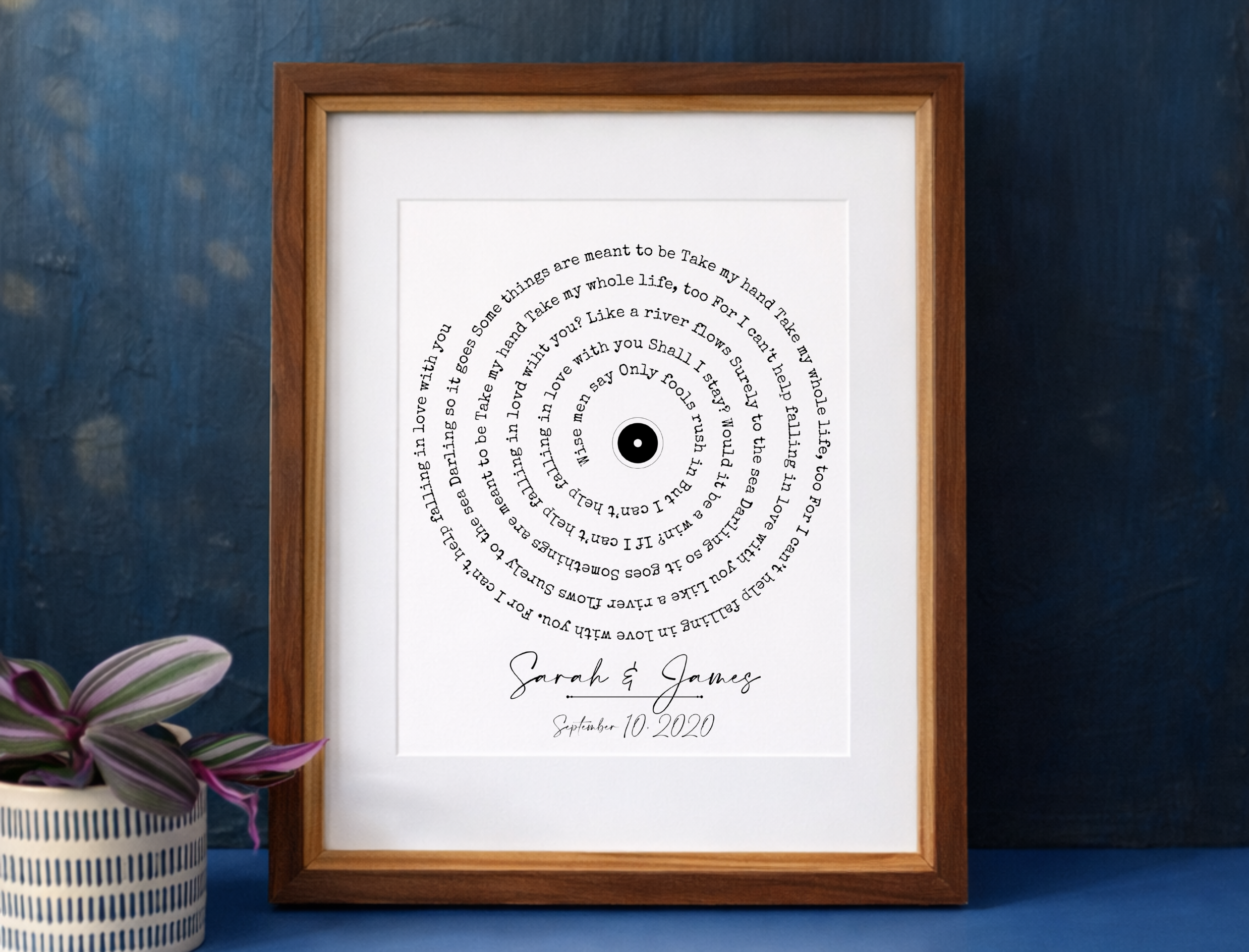 Circular first dance song lyrics print on 100% cotton paper in a walnut frame personalized for Sarah and James — unique 1st or 2nd anniversary cotton gift from All Things Cotton Paper