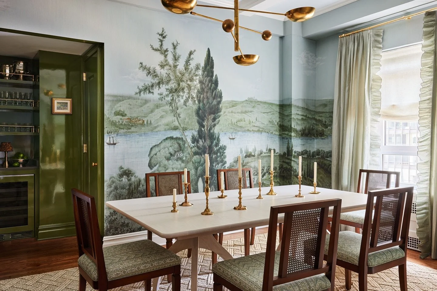 At KPD we thoroughly consider every design element in a room and how they work both on their own and together. The river bed depicted in the mural continues in the view outside the window. The modern light fixture keeps the room from being too tradit