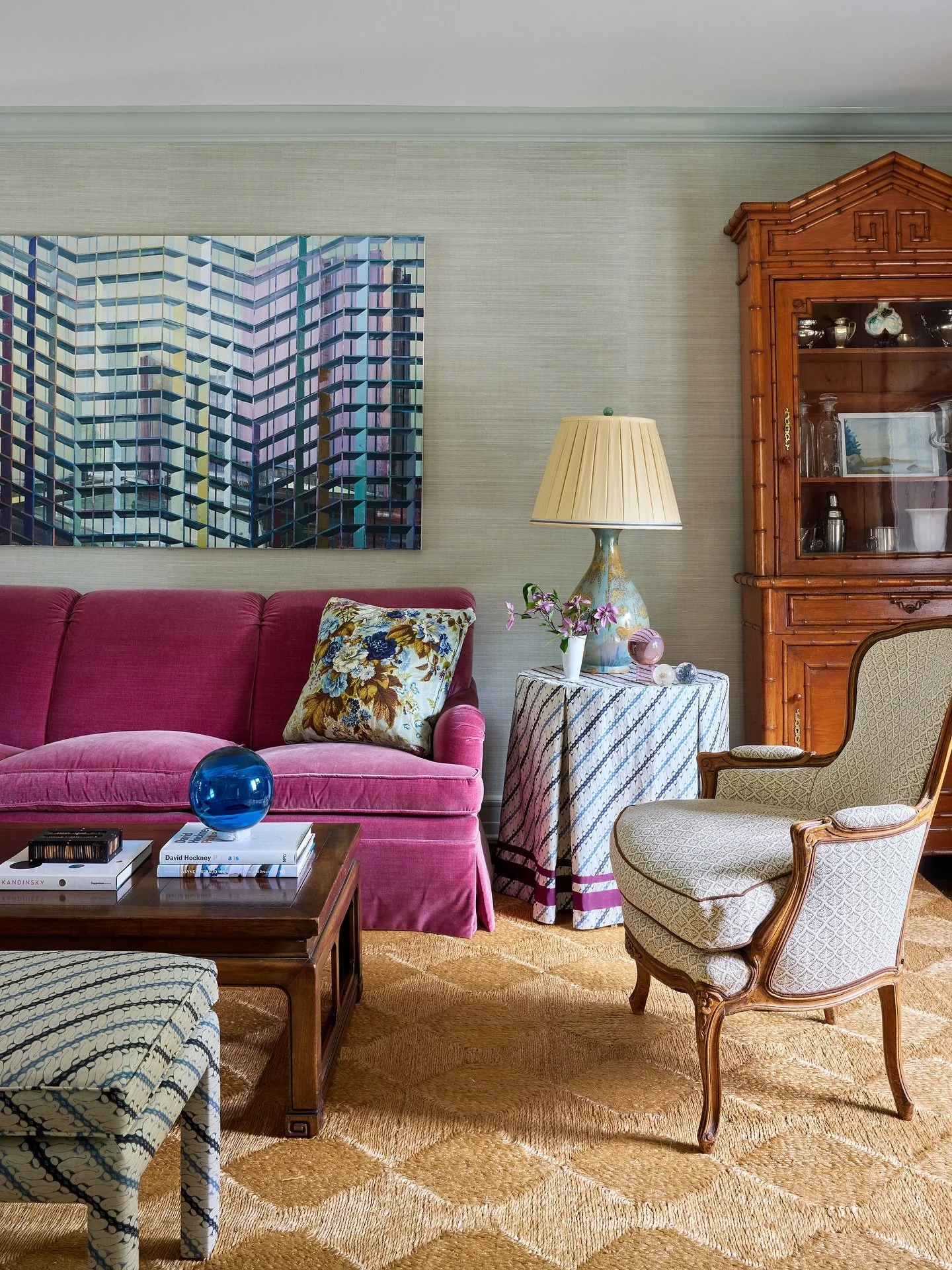 The kids are home and the house feels complete again. How do you want your home to feel? For this living room we wanted sophisticated, unique and fun taking the color palette from the sofa and throw pillows the client already owned. The fabric on the