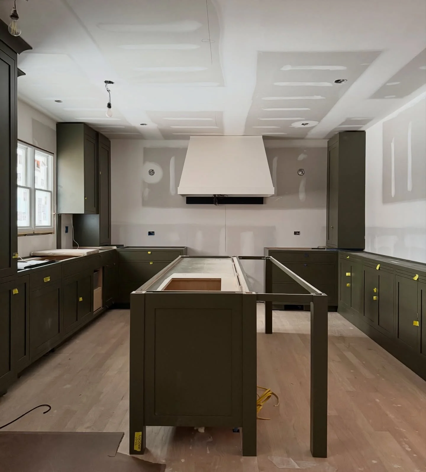 Exciting kitchen install progress!! I couldn&rsquo;t be happier with the cabinet color. We tested a LOT of colors to find my perfect one. Glass front counter cabinets still to be installed on the right side. Countertop templating is next!