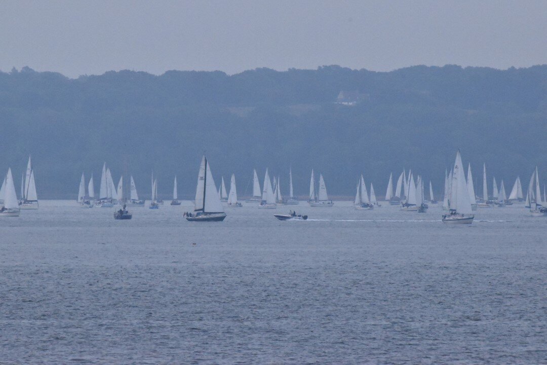 2021 Round the Island Race Start off Cowes in Fog. Over 2000 boats entered with conditions from flat calm to 25 knot gusts, both fog and sun. Congratulations fo Peter Cunningham&rsquo;s multihull MOD70 PowerPlay in being the first to finish with a ti