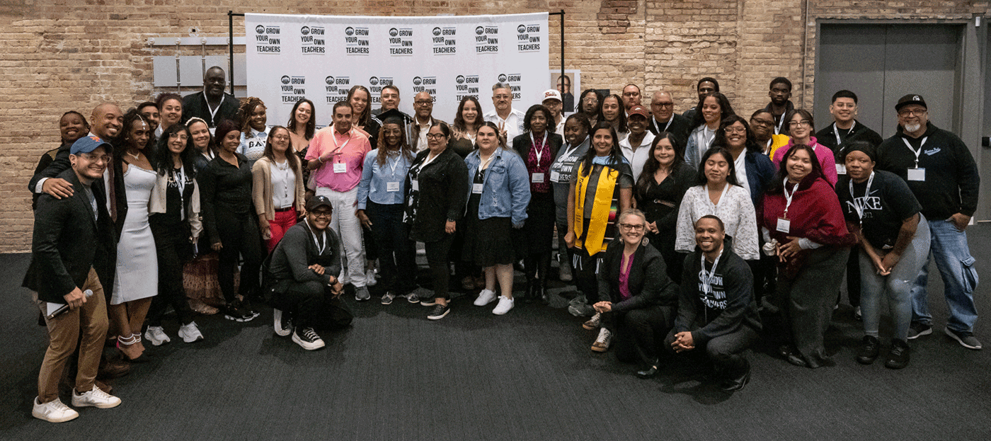 GYO-IL Graduates and staff pose together in a group shot.