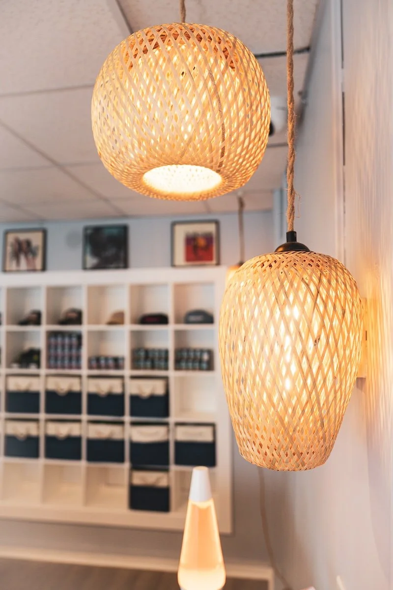 Coastal-inspired interior featuring beach-themed pendant lighting inside Beach Boys Beach Club in Old Orchard Beach. Our welcoming recreational weed shop combines relaxed beach vibes with a curated selection of premium adult-use cannabis products fro