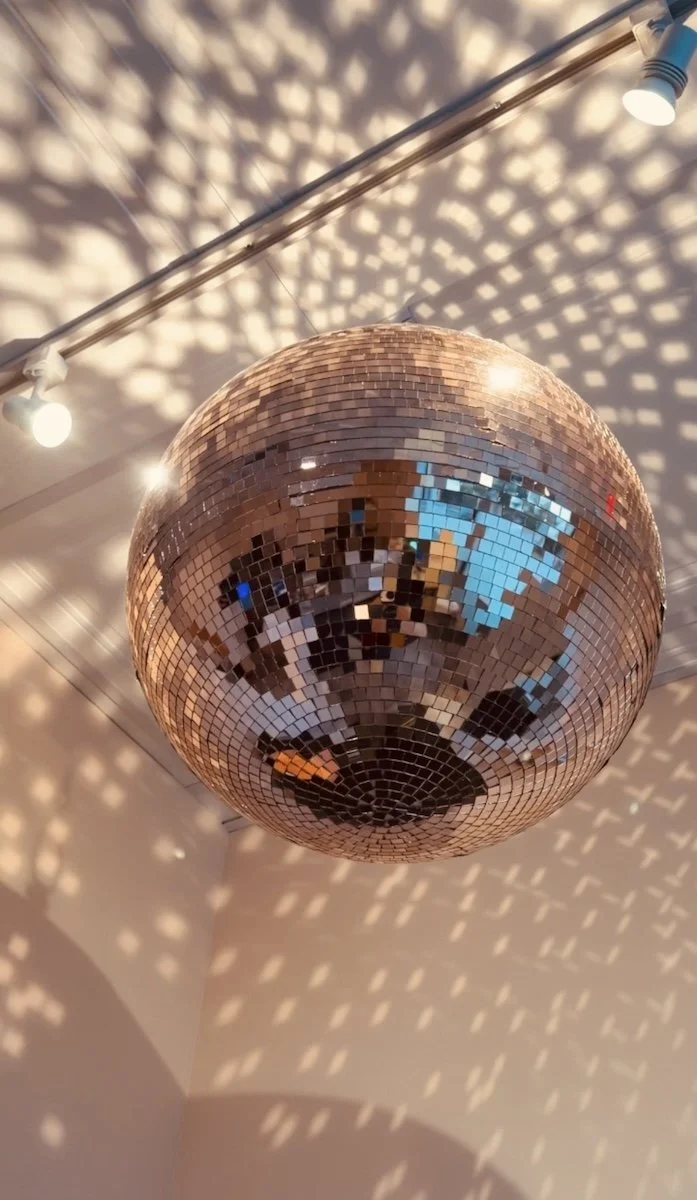 Signature disco ball inside Beach Boys Cannabis Co. in South Portland, creating a relaxed and welcoming atmosphere for medical cannabis patients. Our modern medical dispensary combines knowledgeable service, premium Maine cannabis products, and an in