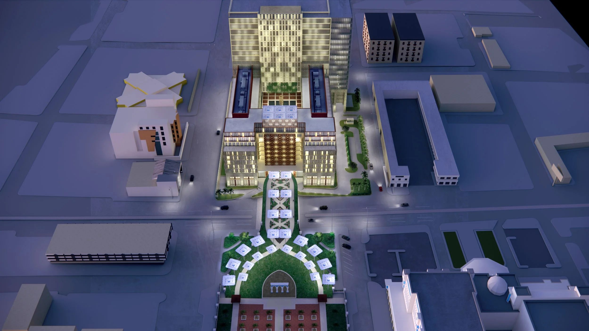 Evening Aerial View of Hotel and Office Complex, Connecting by Bridge to Public Park