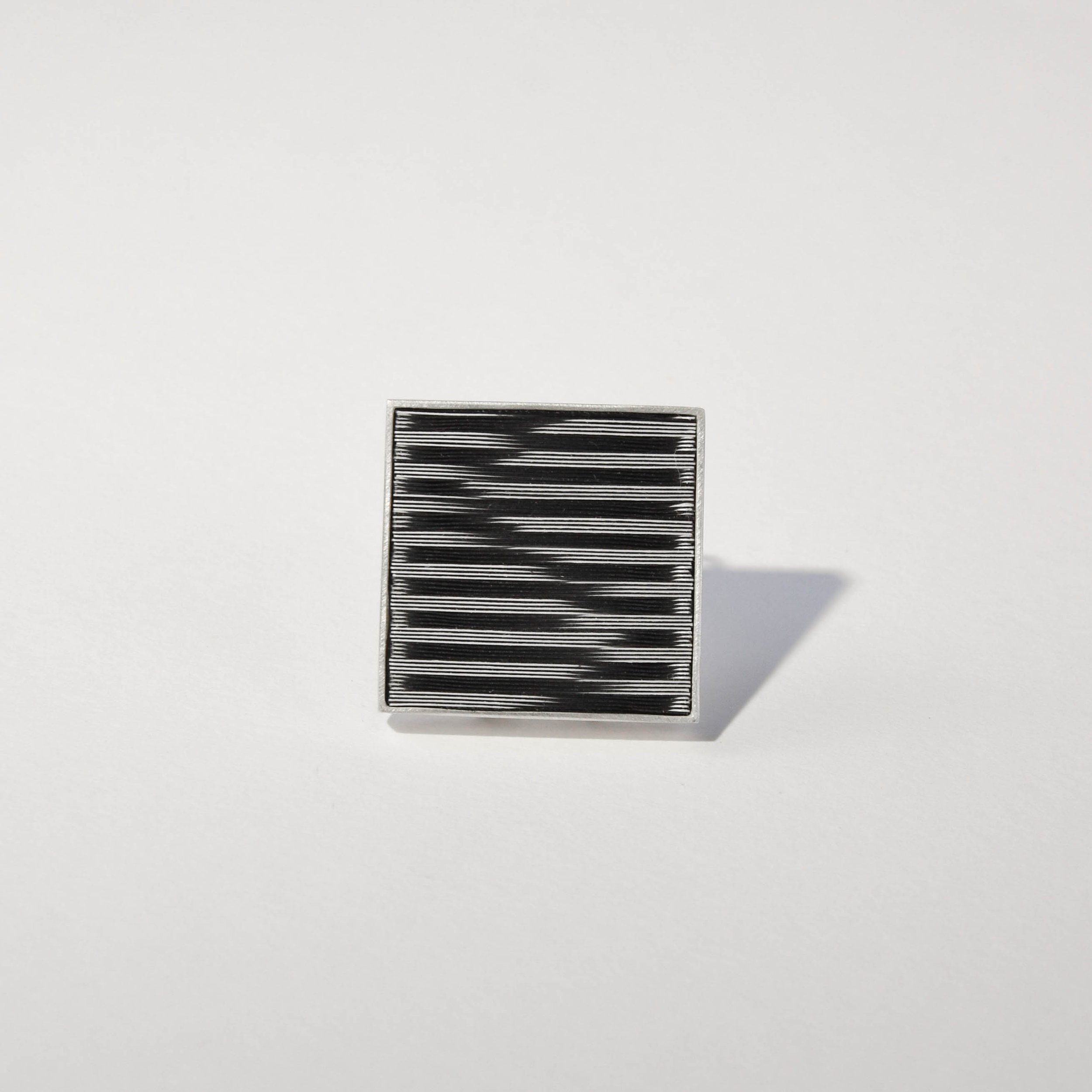 b-w linear brooch E-W.jpg