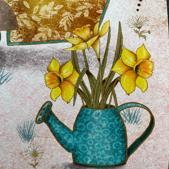 daffodils in a watering can