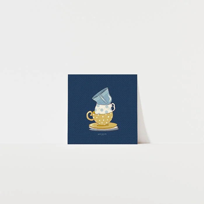 blue and neige teacups on blue ditsy background