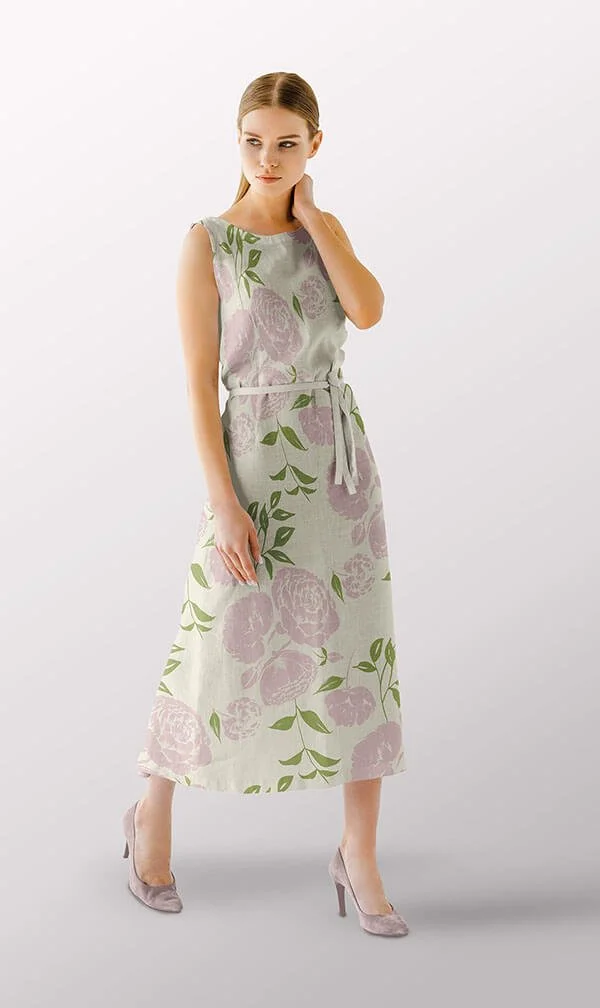 Floral silhouettes in green and pink on beige dress